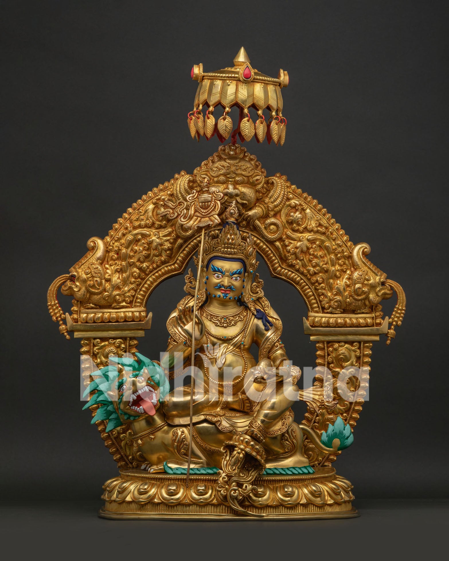 Front view of 24K gold-gilded Vaisravana Namtoshe statue seated on a snow lion, Nepalese copper art