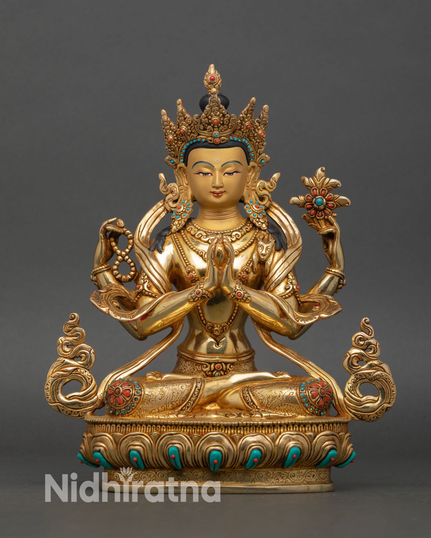 Front view of Chenrezig statue four armed Avalokiteshvara copper 24K gold gilded Nepal