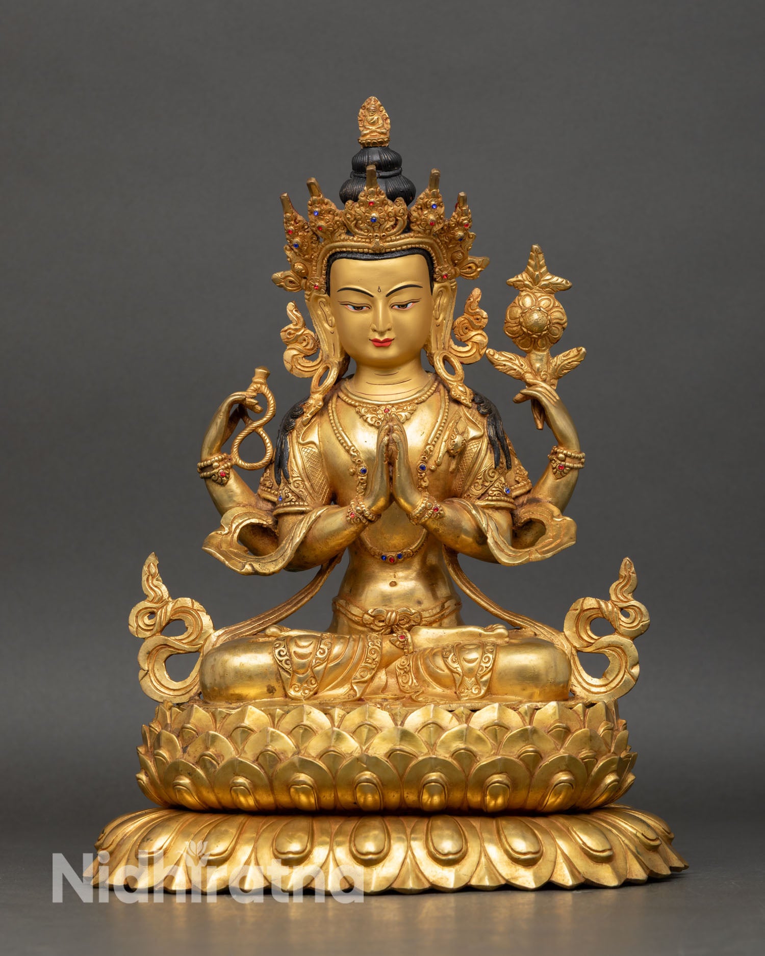 front view of chenrezig statue, hand-gilded copper bodhisattva with lotus pedestal
