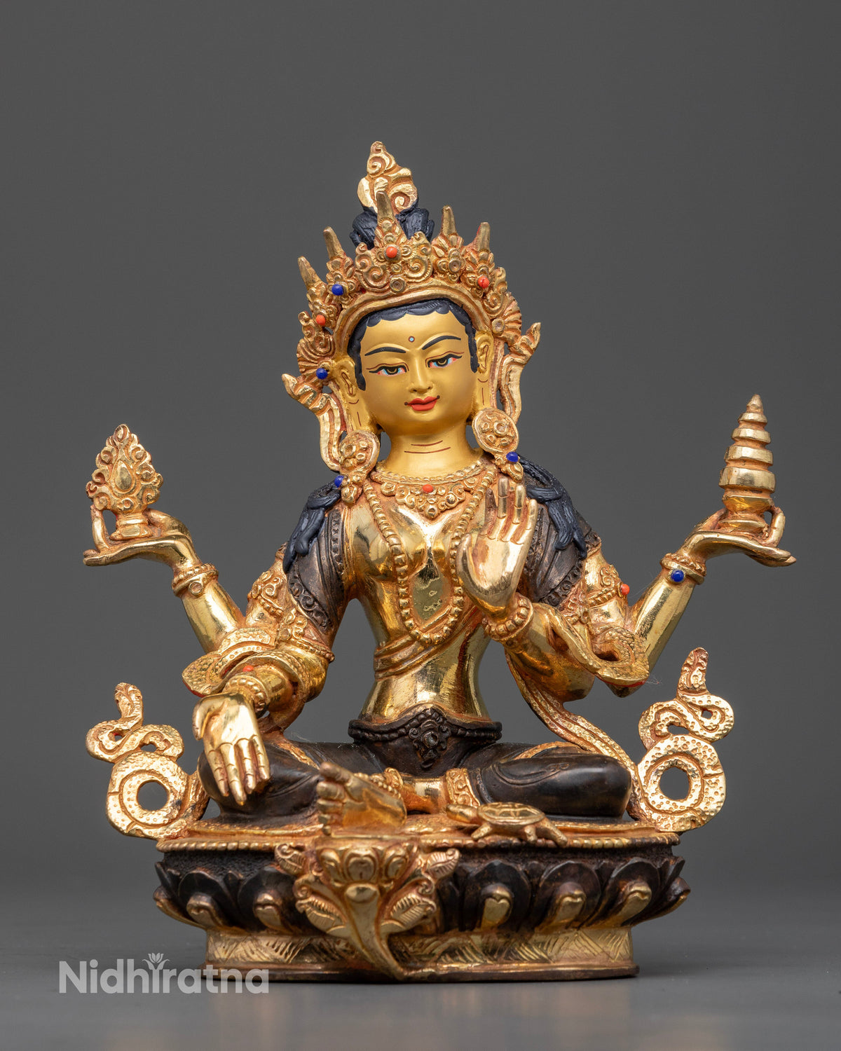 Front view of Goddess Laxmi Statue crafted from copper with oxidized detailing and gold-gilded accents