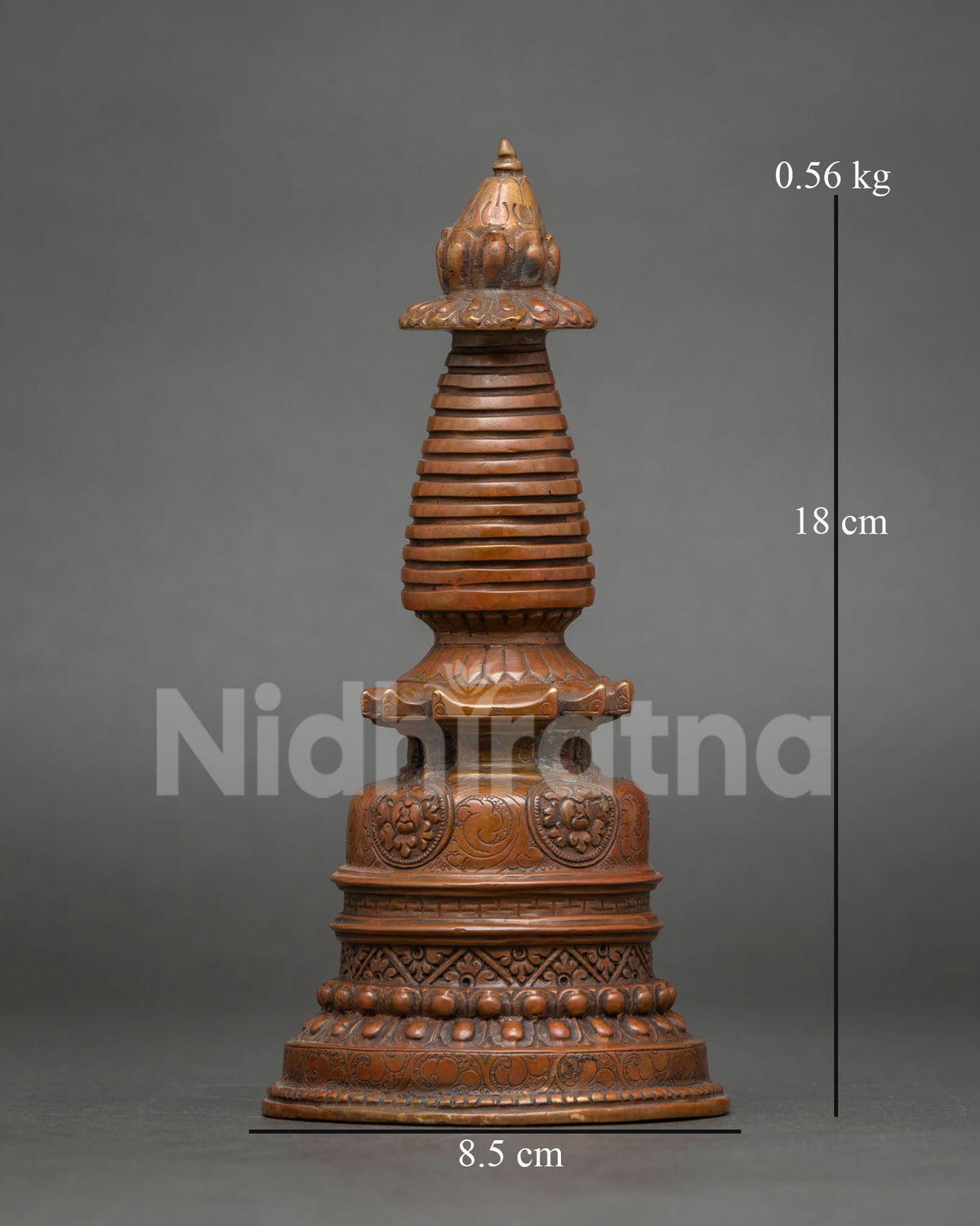 Front view of handcrafted copper Kadampa Stupa with oxidized finish from Patan, Nepal