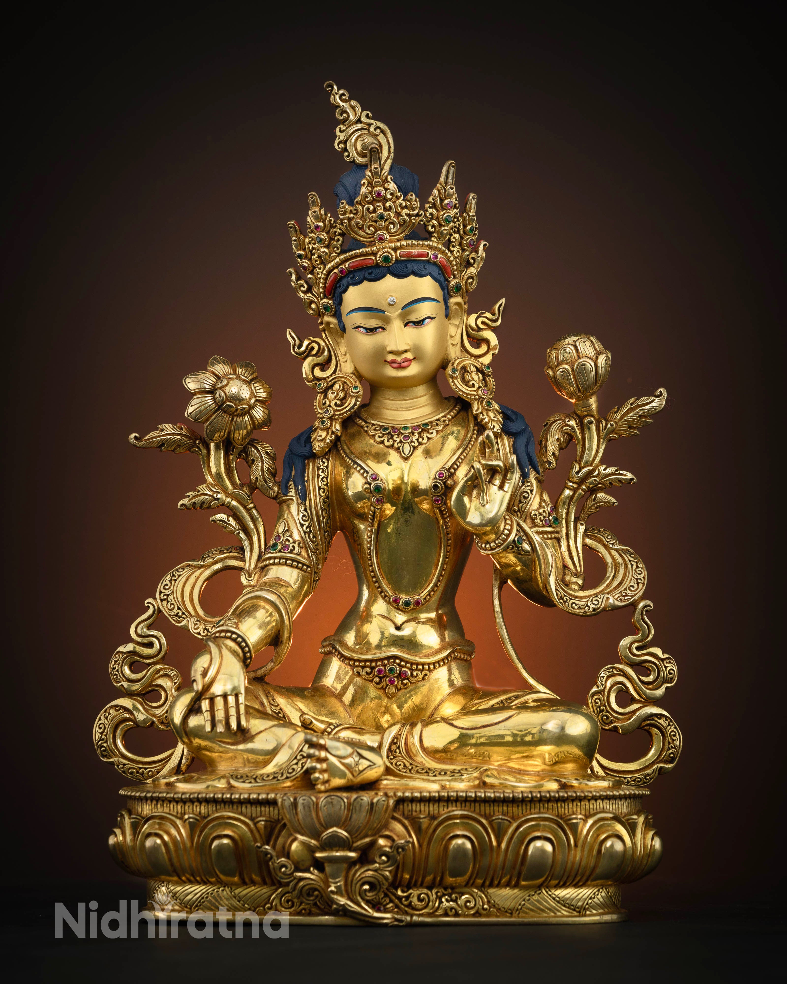 Front View of handcrafted Green Tara Buddhist statue seated in Lalitasana posture