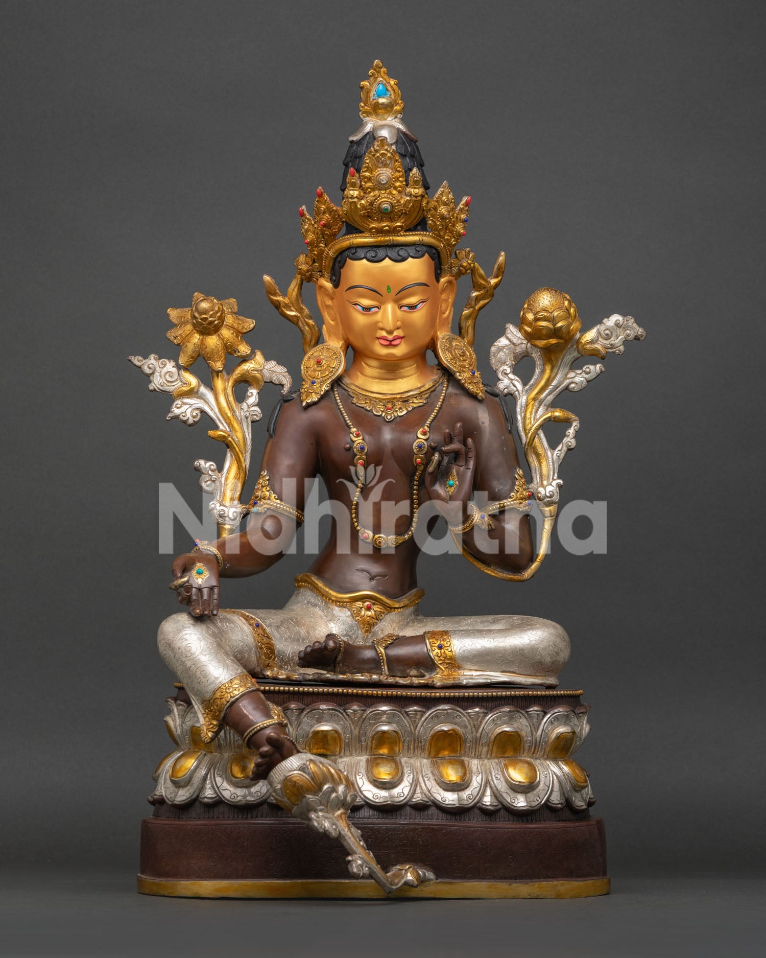 Front view of handcrafted Green Tara statue in oxidized copper with gold gilded finish