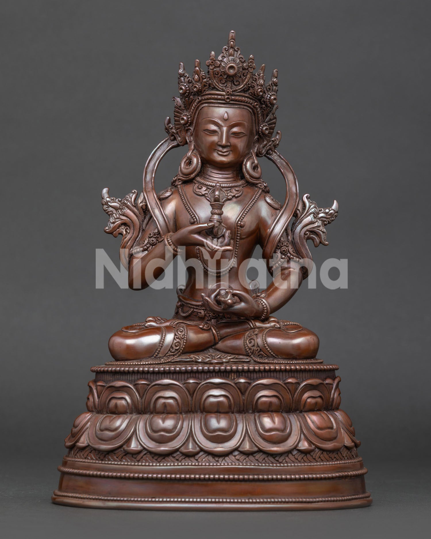 Front view of handcrafted Vajrasattva statue in oxidized copper from Patan Nepal