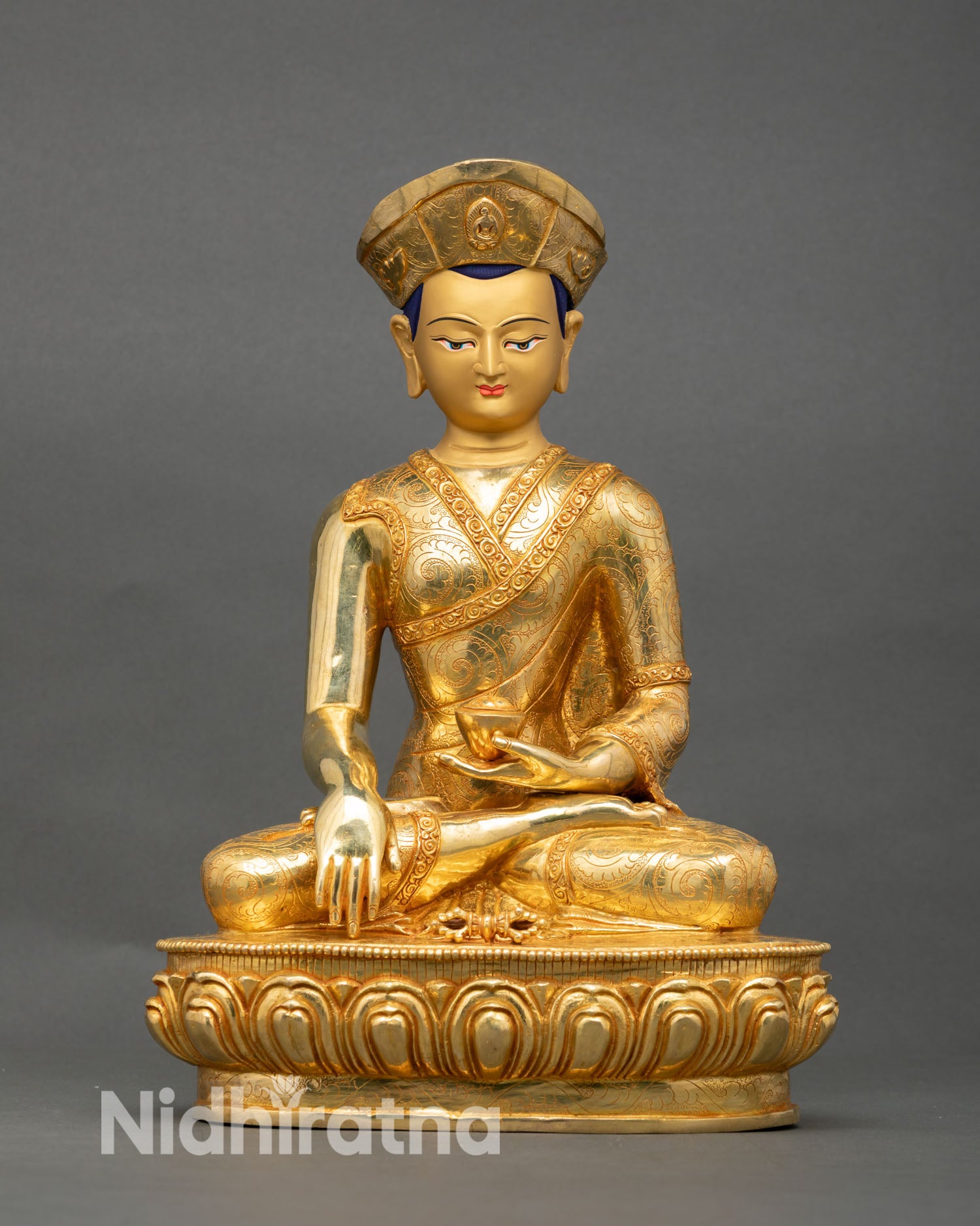 Front view of Jigten Sumgon statue handcrafted in Nepal with gold gilded copper, gold painted face