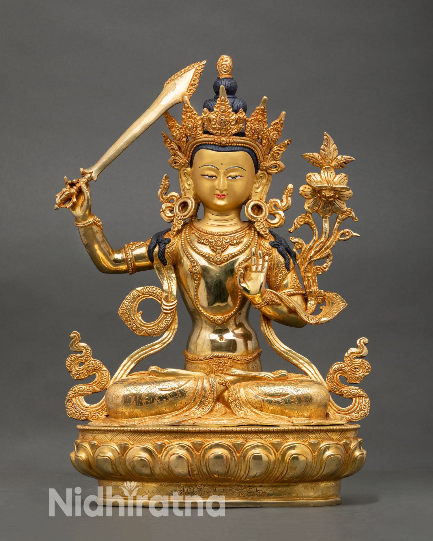 Front view of Manjushree statue handmade Nepal copper with gold gilded details, Bodhisattva of wisdom
