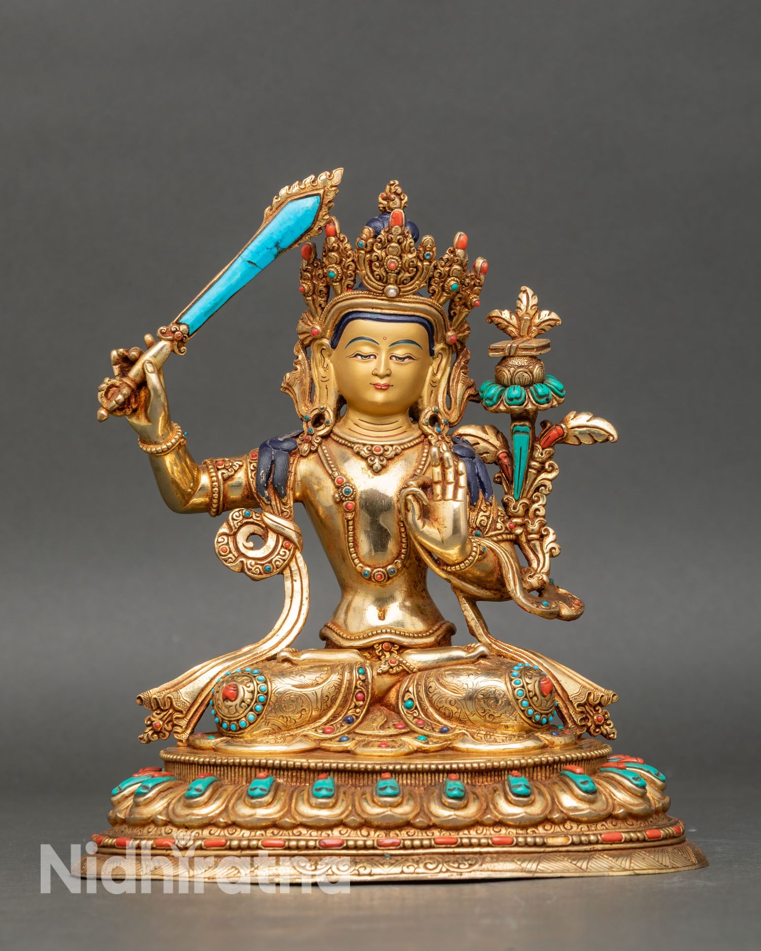Front view of manjushri statue buddhist wisdom deity copper gold-gilded lotus