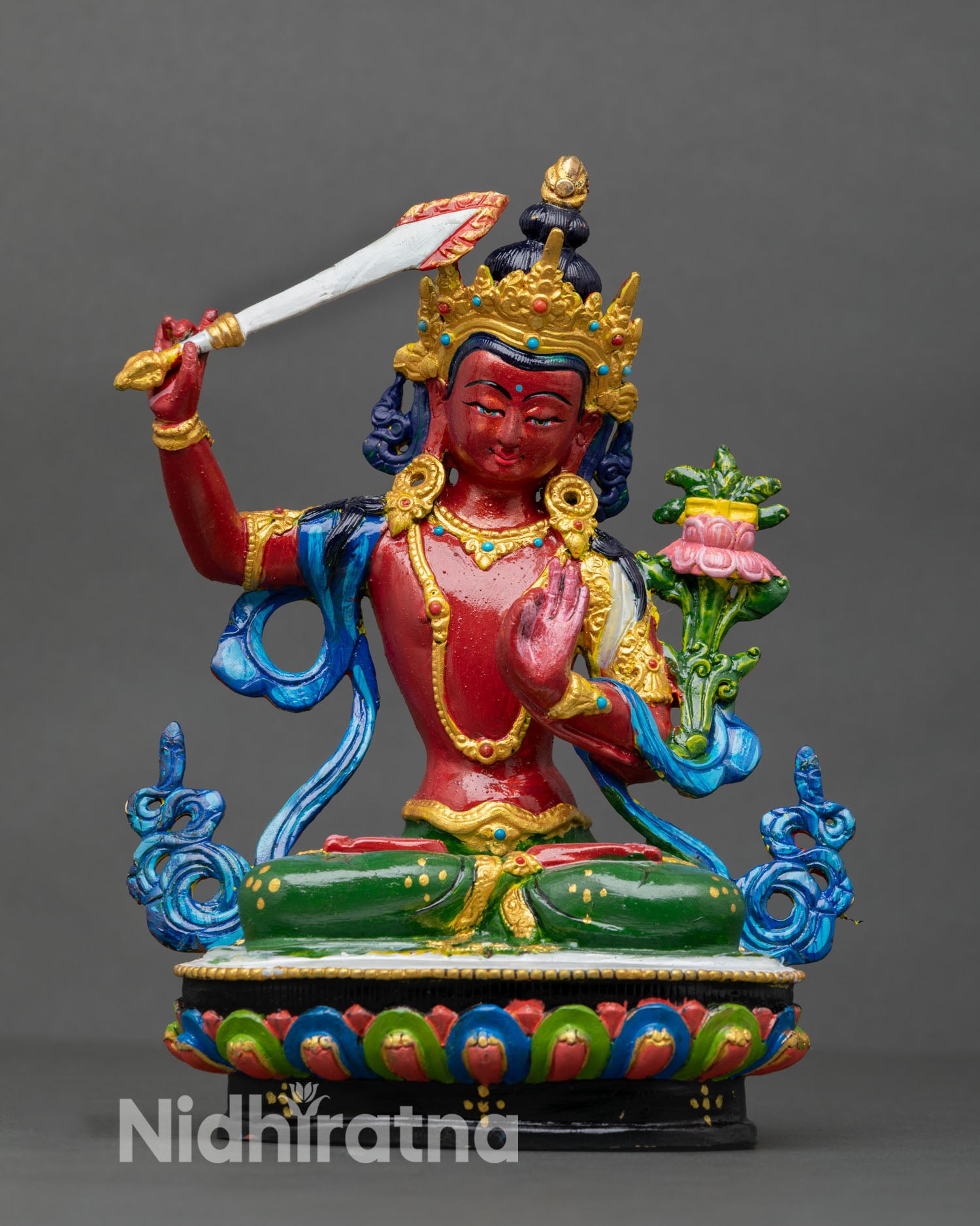 Front view of Manjushri statue handcrafted in Nepal from copper using lost wax technique with hand painted acrylic finish on lotus seat.