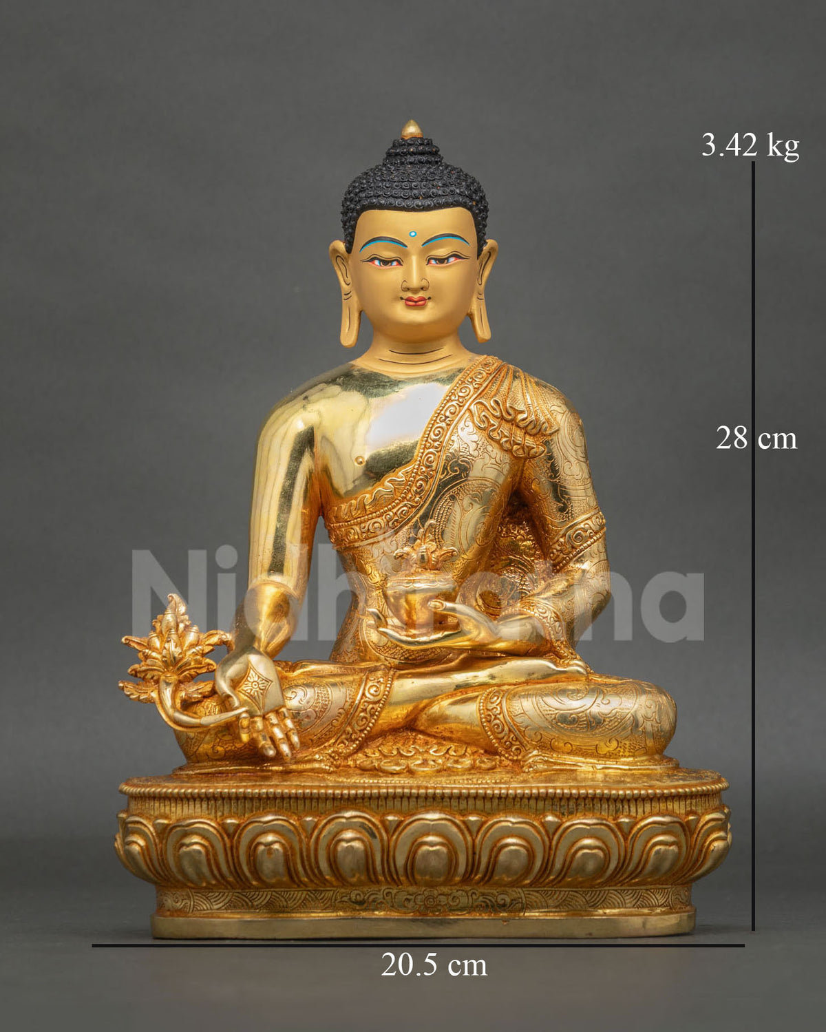 Front view of Medicine Buddha Statue handcrafted in Patan, Nepal, featuring 24K gold fire-gilding and a finely painted gold face.