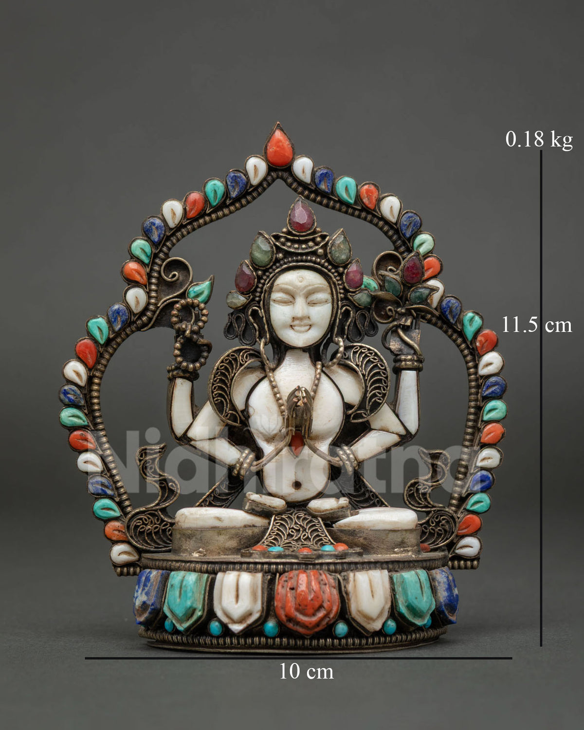 Front view of natural stone Chenrezig statue with gemstone arch, handmade in Nepal