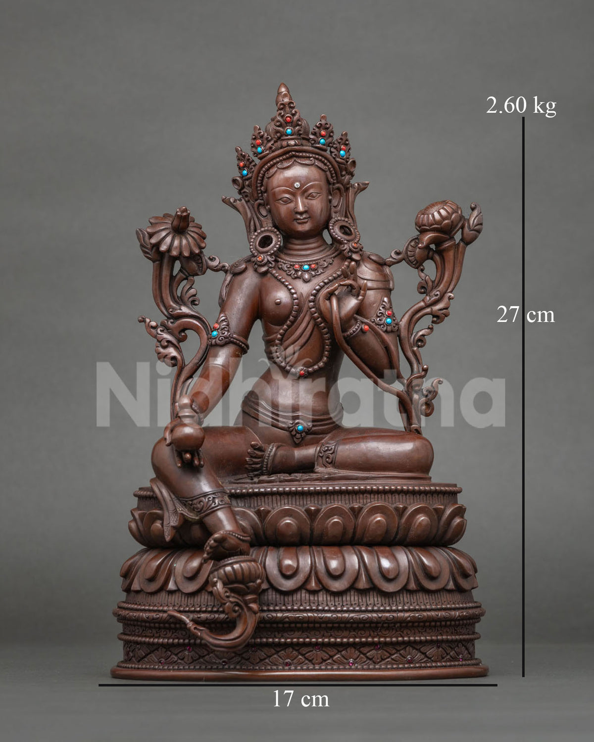 Front view of oxidized copper Tibetan Green Tara statue on double lotus base