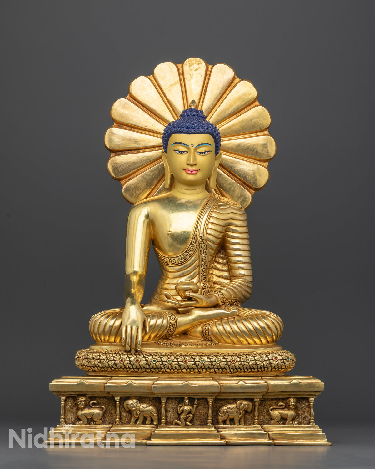 Front view of Shakyamuni Buddha Statue with 24K gold fire-gilding, gold-painted face, and ornate halo
