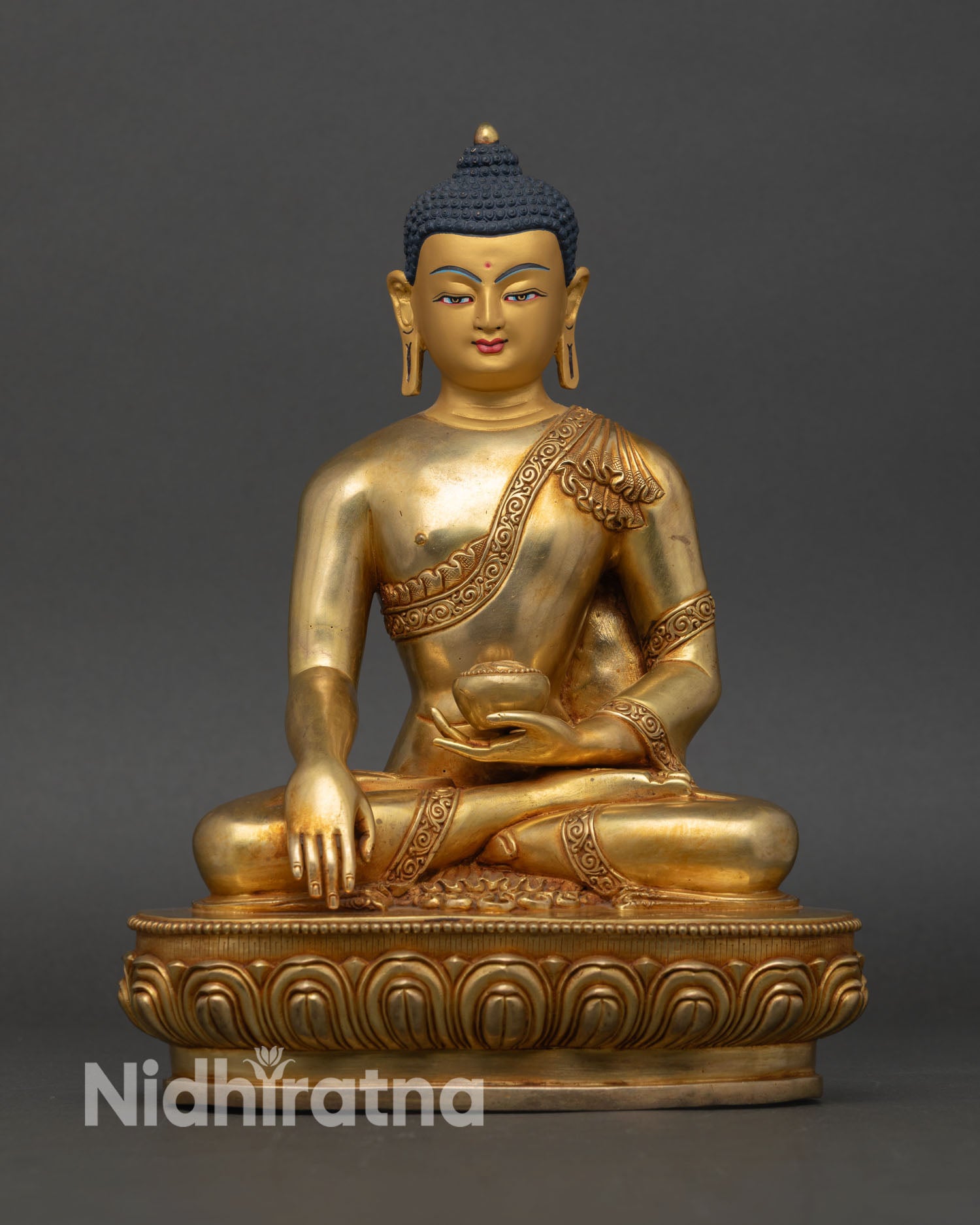 Front view of Shakyamuni Buddha statue copper 24K gold gilded Bhumisparsha Mudra Nepal