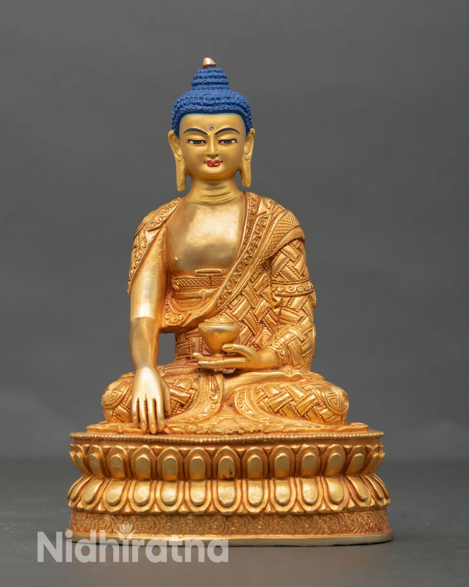 Front view of Shakyamuni Buddha statue handcrafted in Nepal by Newari artisans copper with 24K gold fire gilded finish
