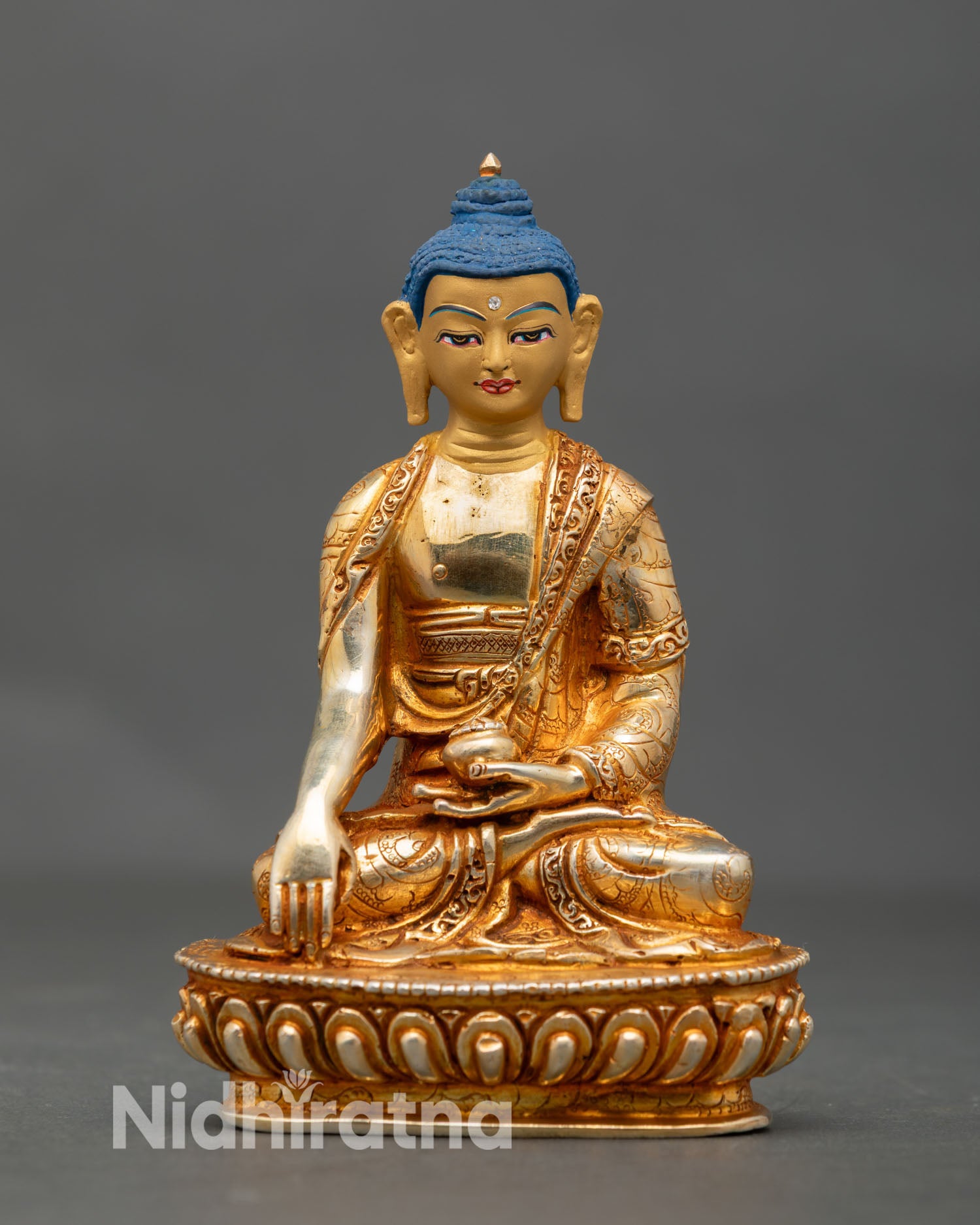 Front view of Shakyamuni Buddha statue handcrafted in Nepal by Newari artisans, gold fire gilded finish Buddhist meditation sculpture