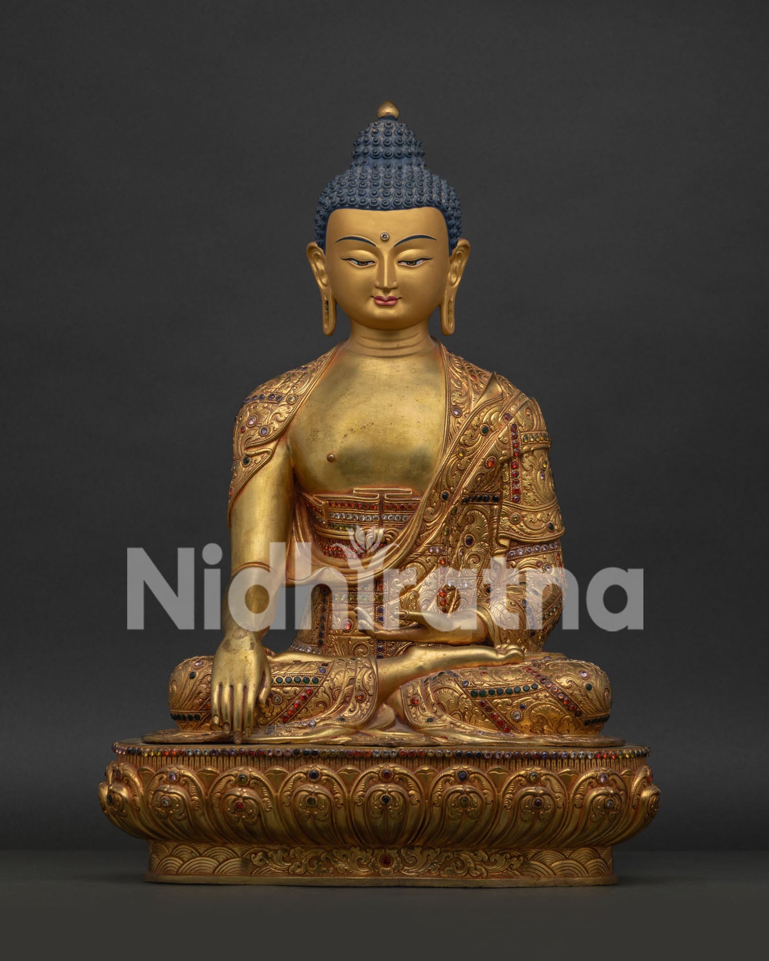 Shakyamuni Buddha Statue handcrafted in Nepal with 24K gold gilding and gemstone inlays front view