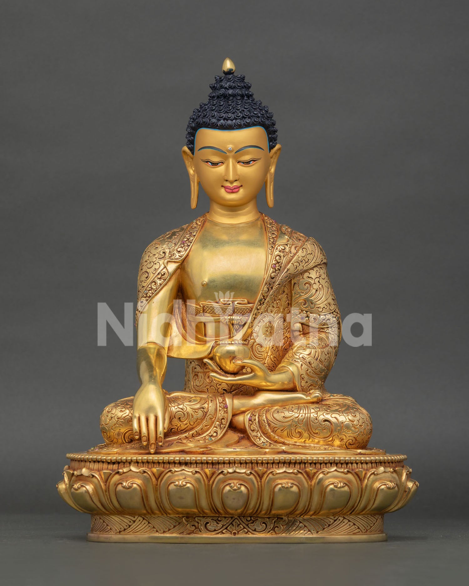 Front view of Shakyamuni Buddha statue, handcrafted in Nepal with serene expression and intricate floral carvings