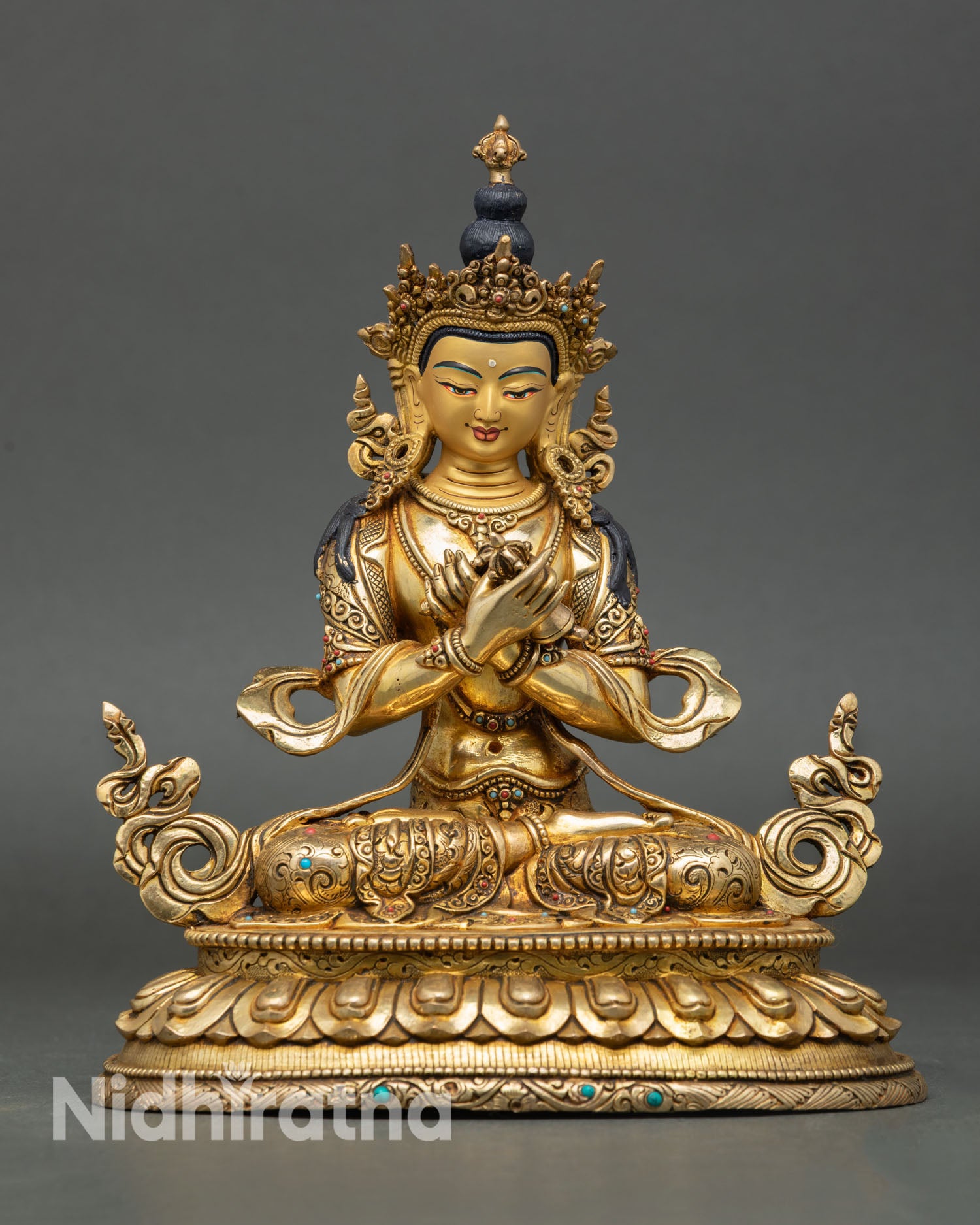 Front view of Vajradhara statue, lost wax copper sculpture with 24K gold gilding and semi precious stone embellishments