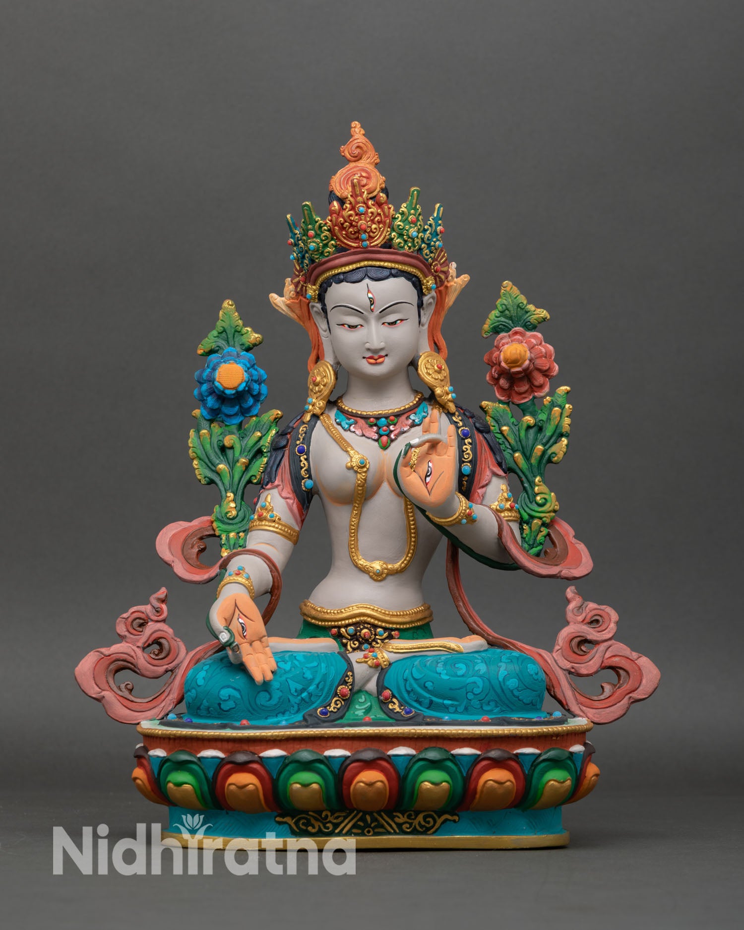 Front view of White Tara statue, handcrafted in Nepal using copper and the lost-wax technique