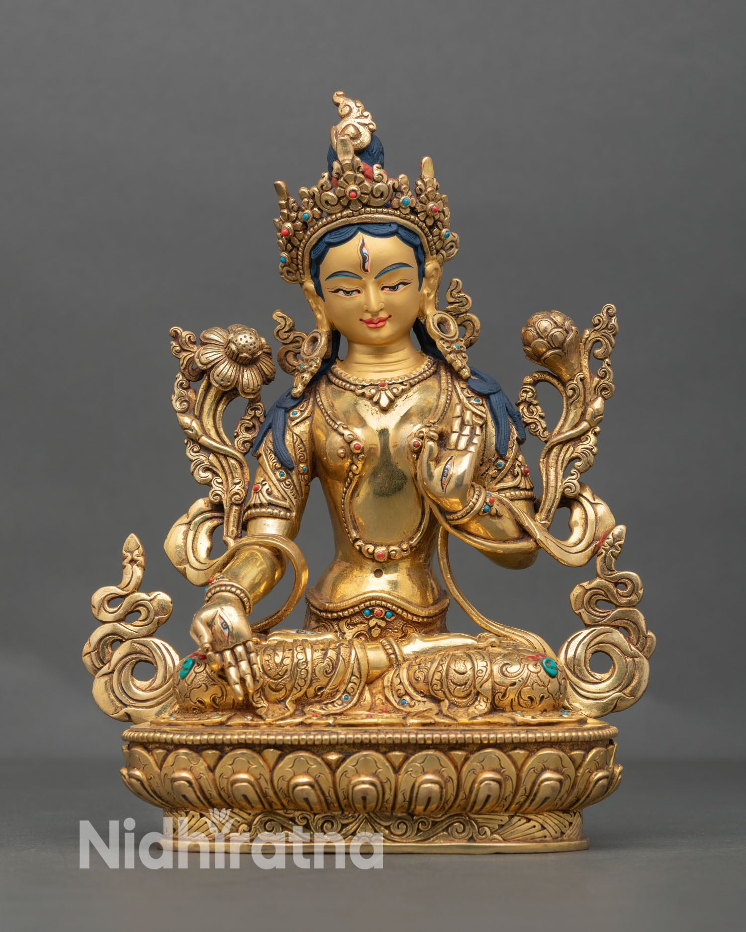 Front view of White Tara statue, handmade in Nepal with gold gilded copper, lotus pedestal