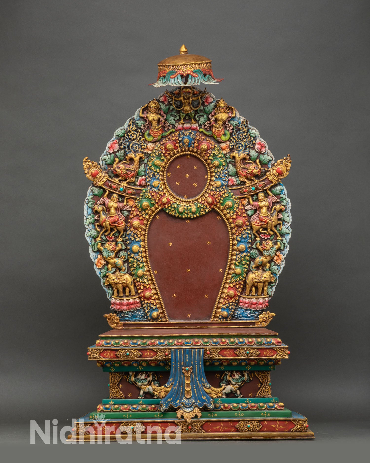 Front view of an ornate throne, handcrafted of copper, gold gilded hand-painted stones