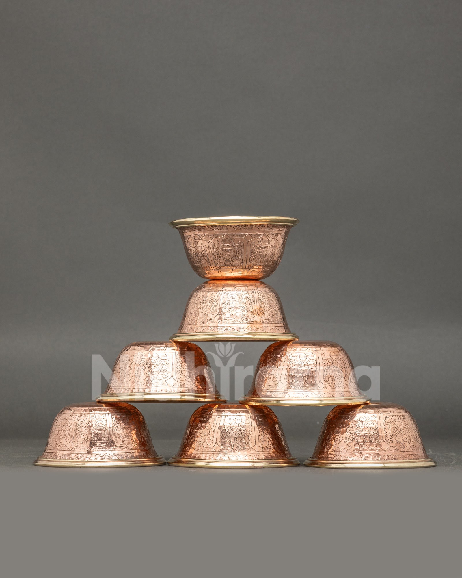 Front view seven water offering bowls handcrafted copper Buddhist altar set