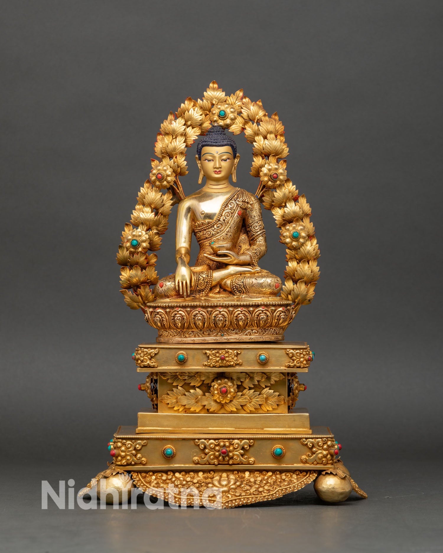 Front view Shakyamuni Buddha statue Kathmandu copper gold gilded bhumisparsha mudra lotus throne Nepal