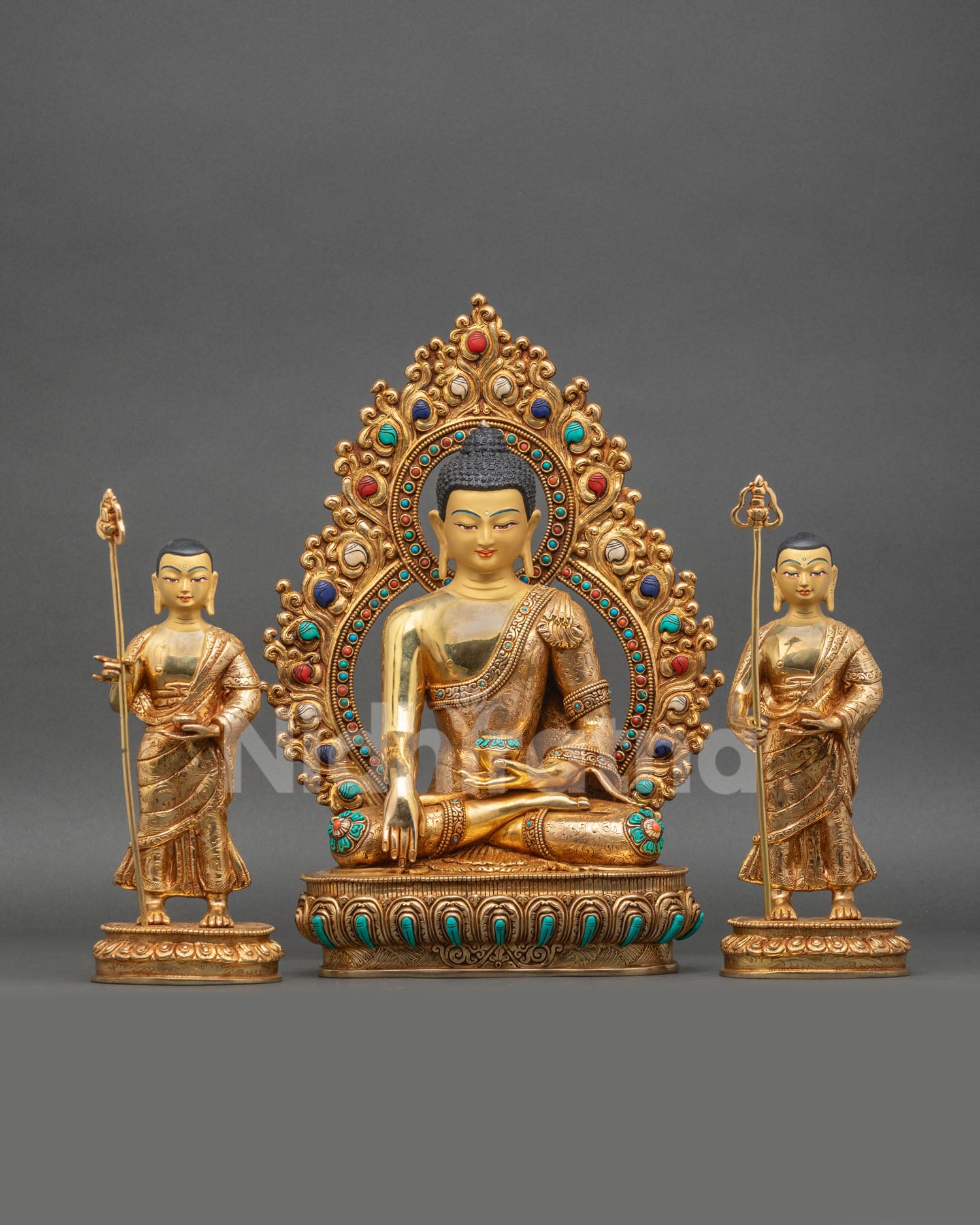 Front view of Shakyamuni Buddha with two disciples Sariputra Maudgalyayana Nepal copper statue