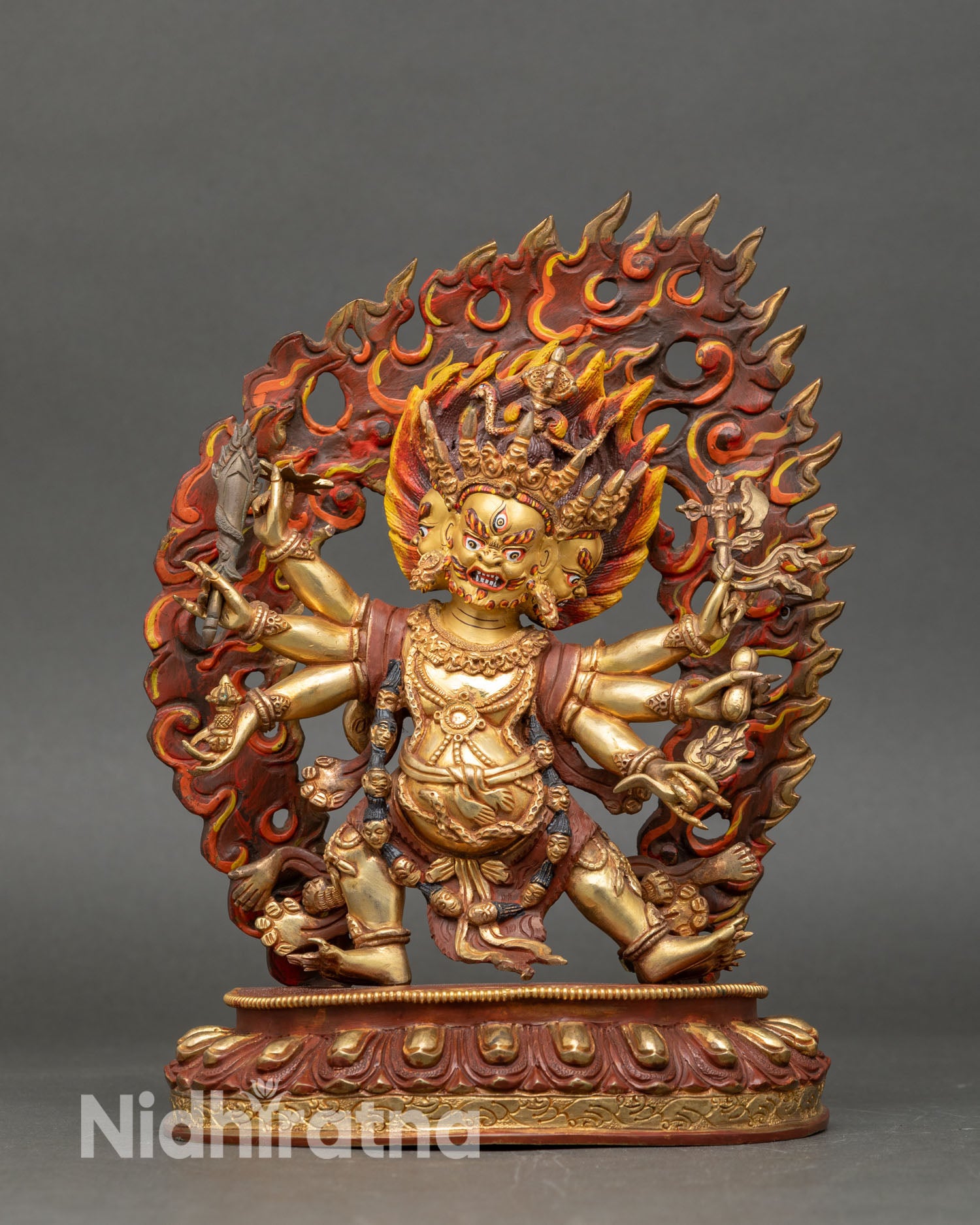 Front view of Six-Armed Mahakala statue, handmade copper Buddhist protector deity from Nepal, standing on lotus pedestal