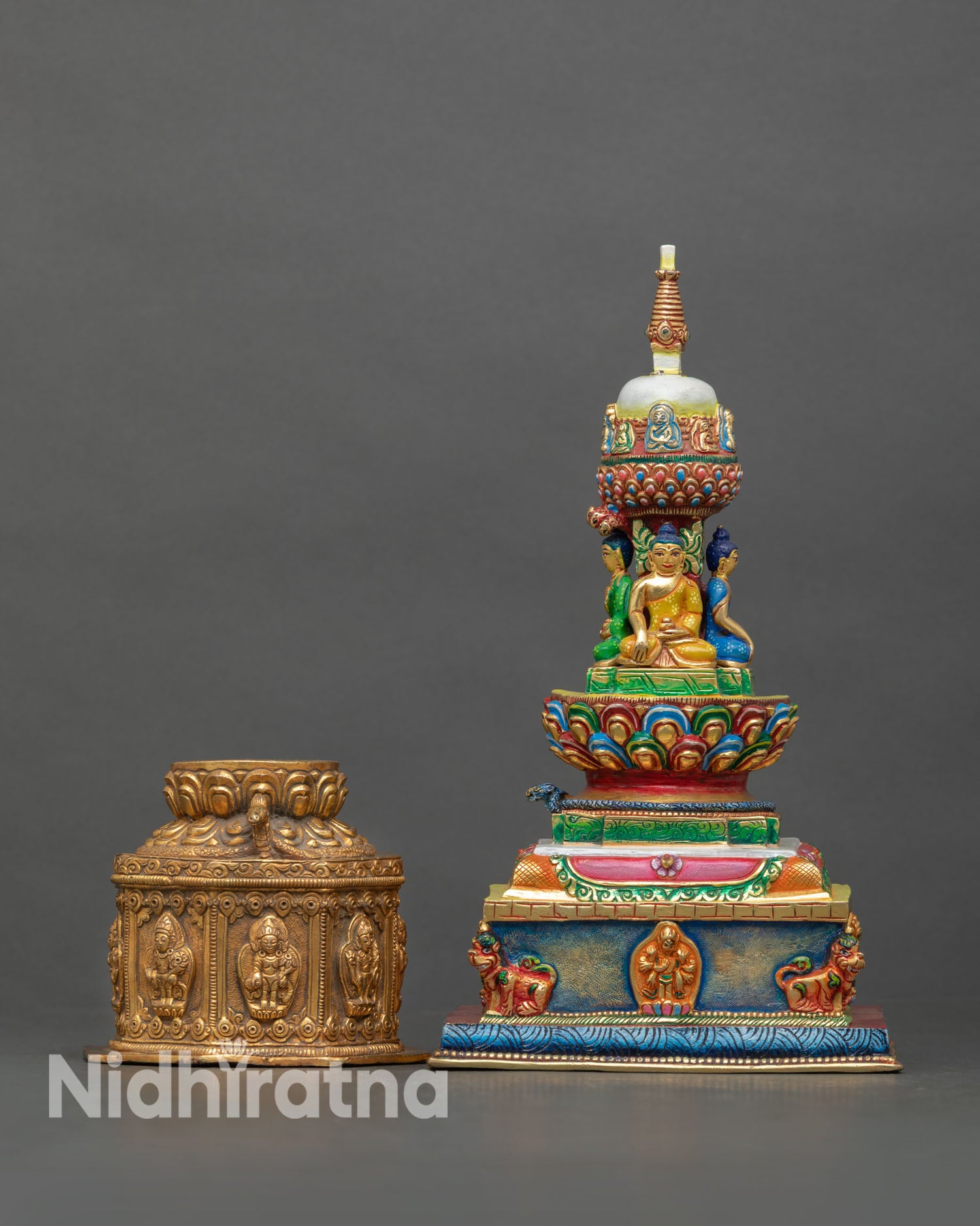 Front view of Stupa with Dharma Dhatu handcrafted by Newari artisans from Patan in copper with gold gilded sacred Buddhist monument details.