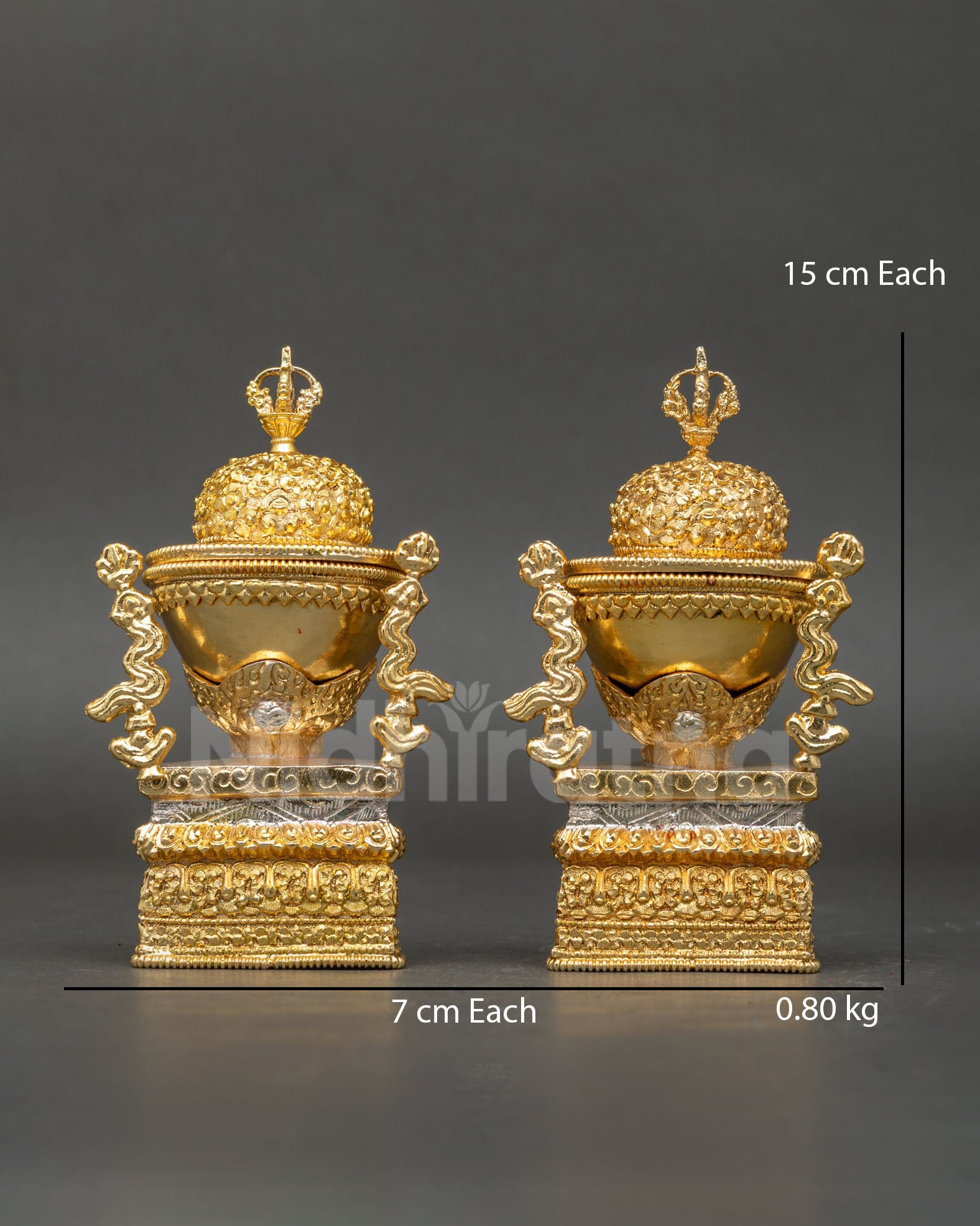 Front view of Tantric Kapala Set handcrafted Tibetan skull cup ritual offering vessel made from copper with gold and silver plated finish and sacred Buddhist tantric symbols
