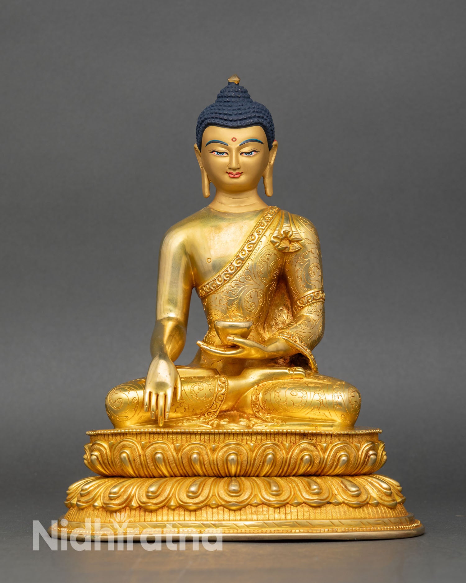 Front view Tathagata Shakyamuni Buddha statue gold gilded copper Nepalese art