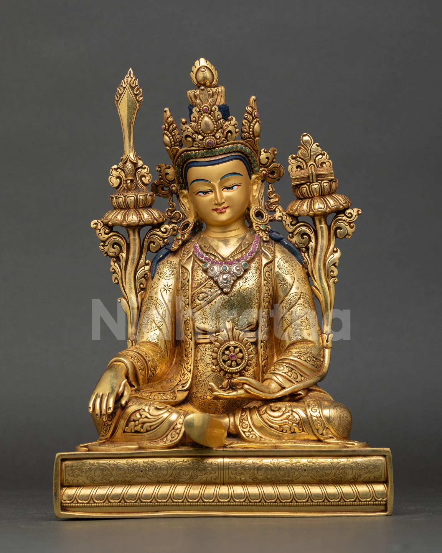 Front view of Trisong Detsen statue Tibetan Dharma King handcrafted in Nepal gold gilded copper with semi precious stones for altar decor