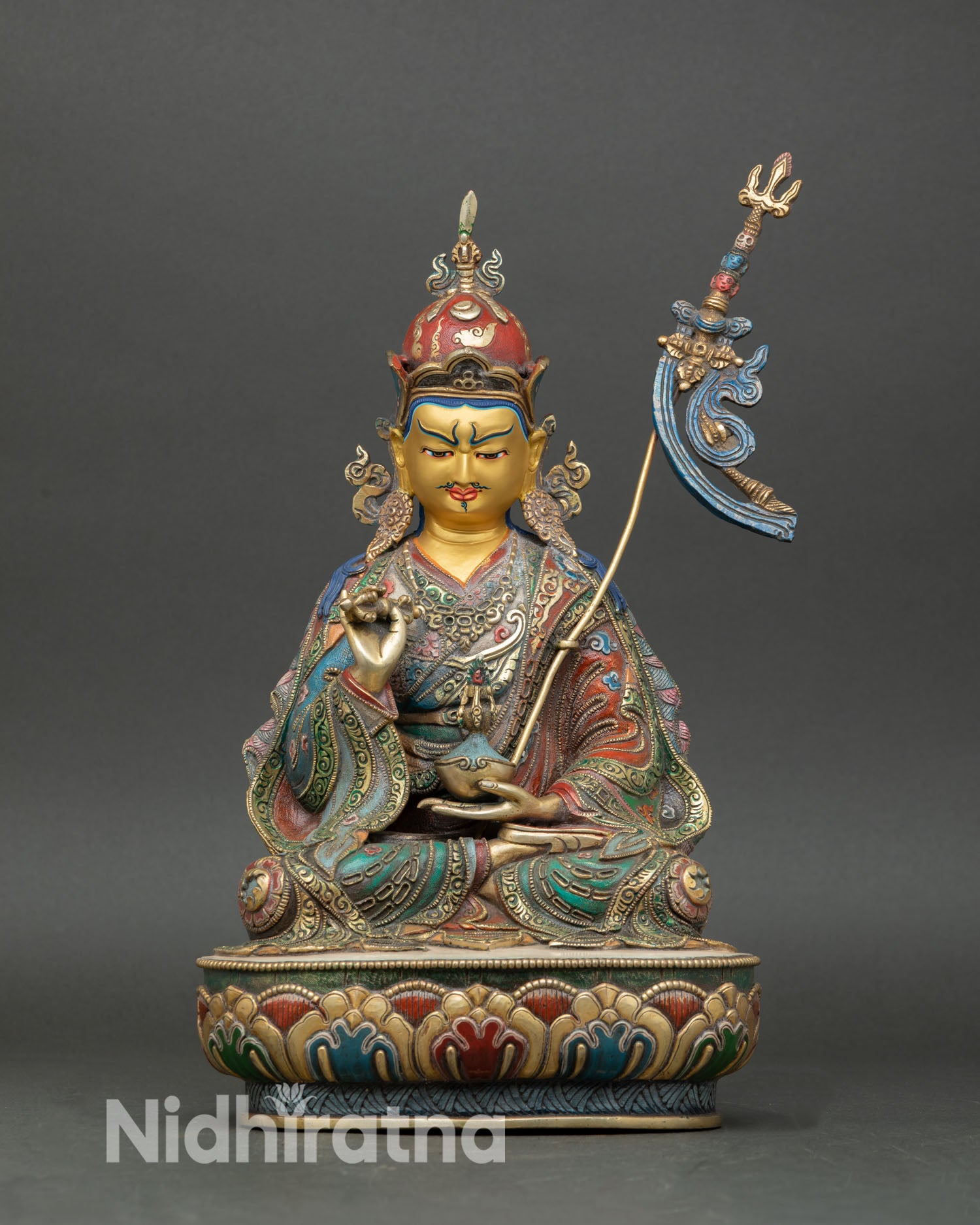 Front view of Tsokye Dorje statue Lake Born Vajra copper sculpture from Patan Nepal 24K gold face lotus pedestal Vajrayana deity