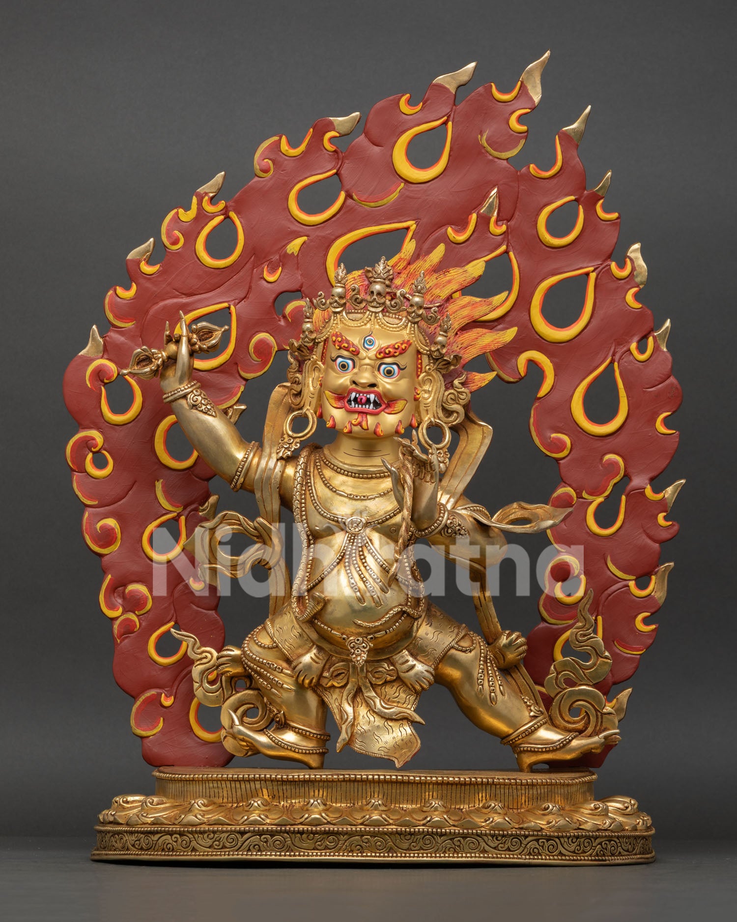 Front view of Vajrapani statue, handmade in oxidized copper with gold painted face