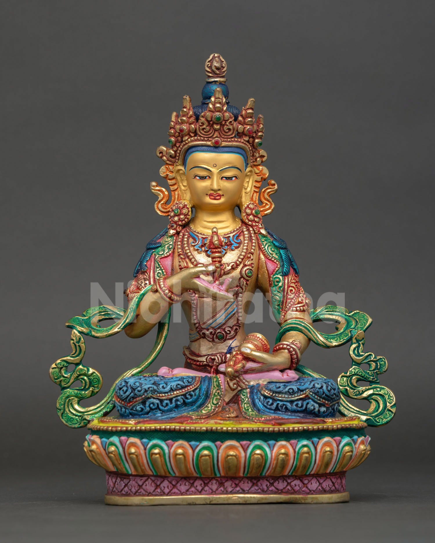 Front view of Vajrasattva statue handcrafted in Nepal copper with gold gilded details hand painted acrylic and semi precious stones for Buddhist altar decor