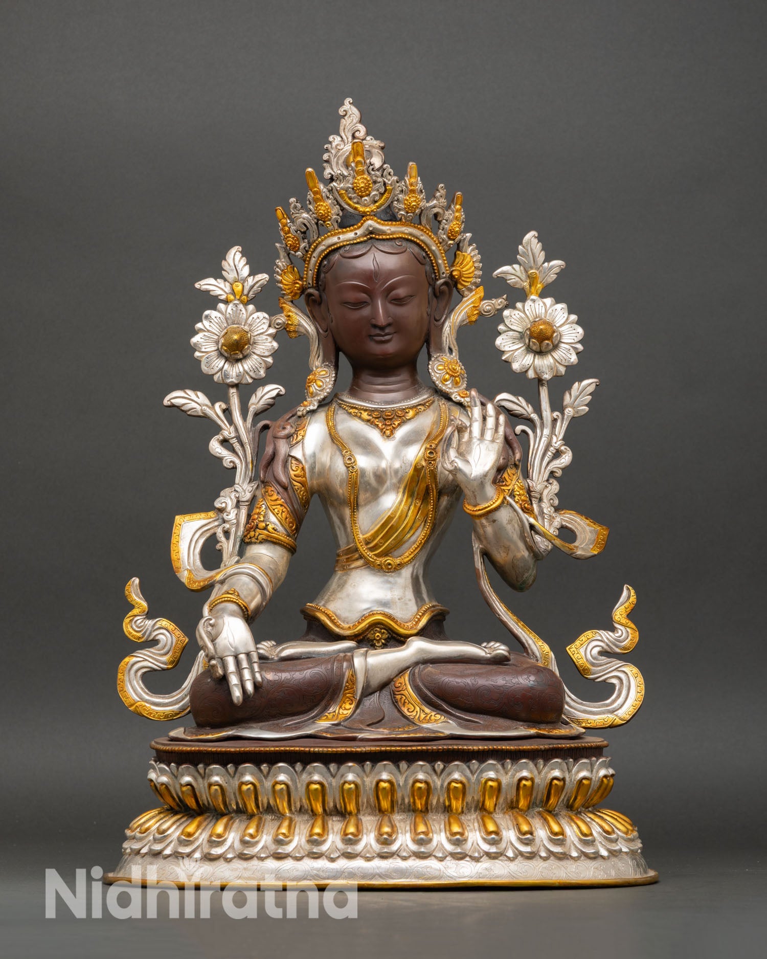 Front view of White Tara statue gold gilded copper lotus seat seven eyes detail