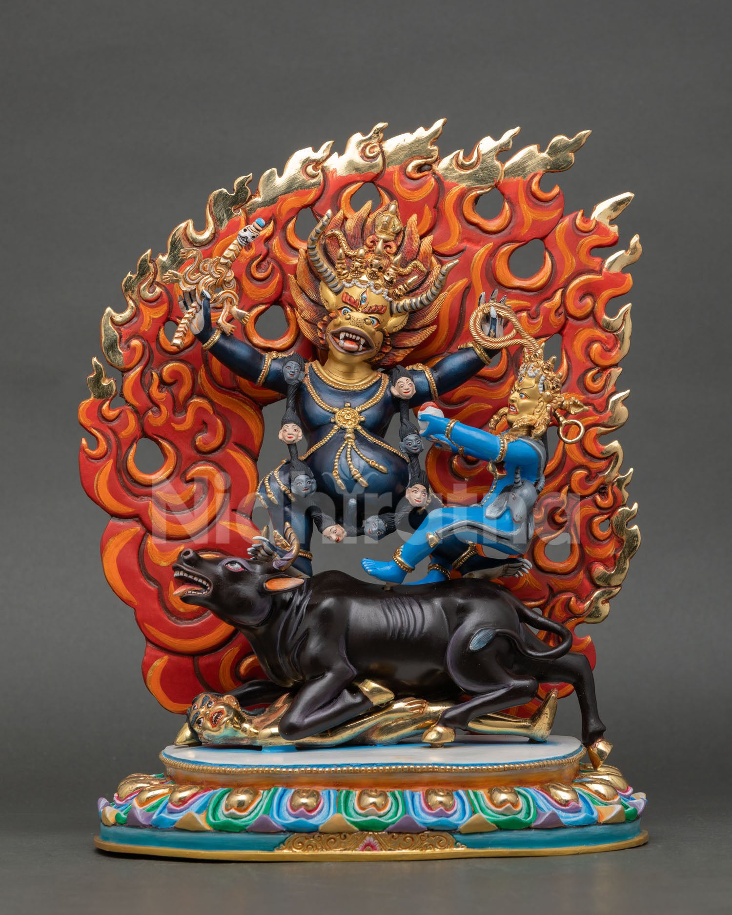 Front view of Yamantaka statue handcrafted in copper with gold painted face Nepal Vajrayana wrathful deity Buddhist protector sculpture altar decor