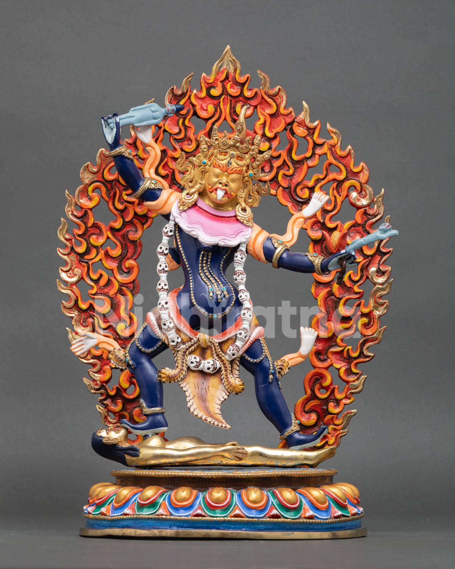 front view, ekajati statue copper buddhist protector nepal gold gilded lotus flaming halo