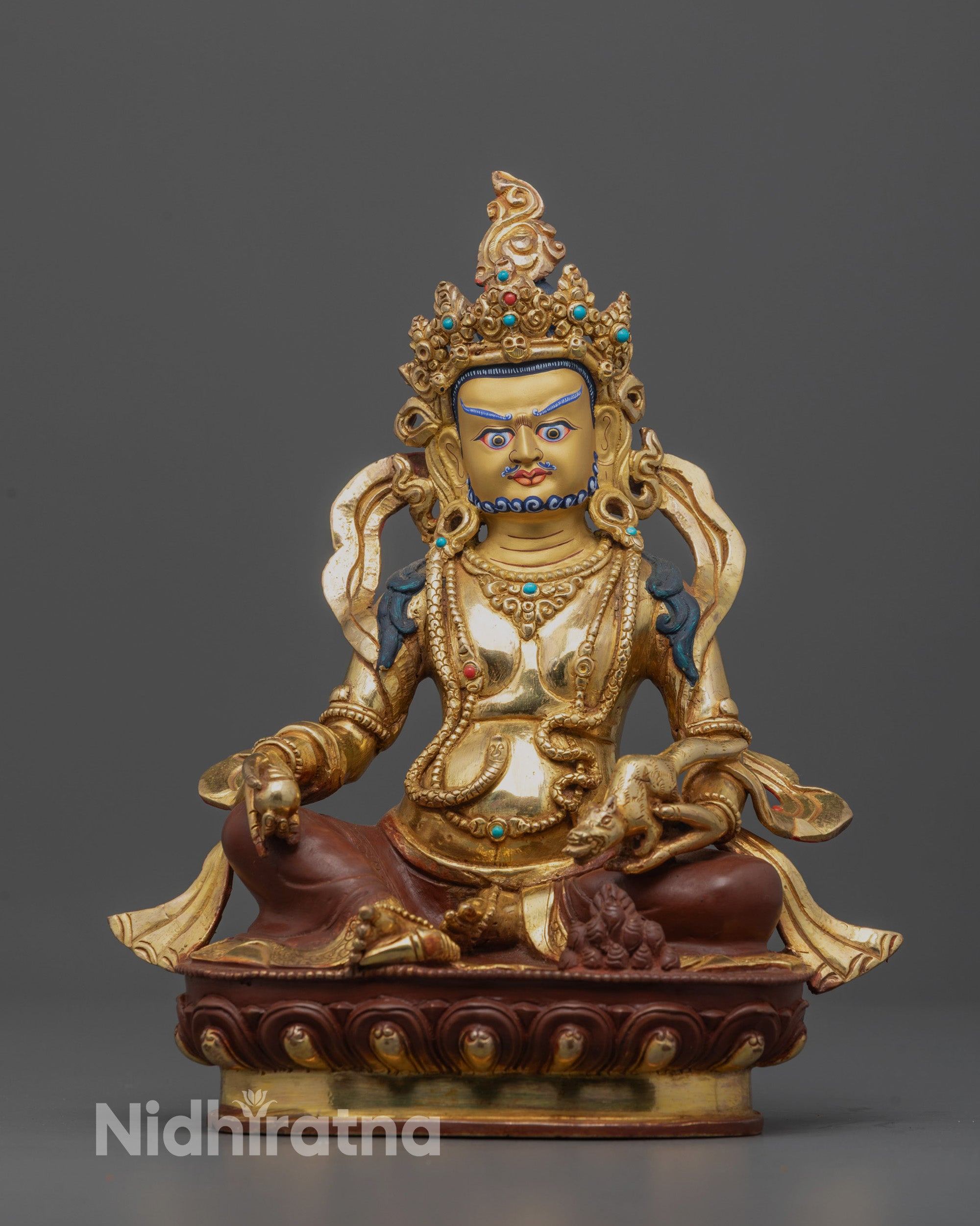front angle Dzambhala Statue with gold-gilded face and jewel-spitting mongoose, full view detail