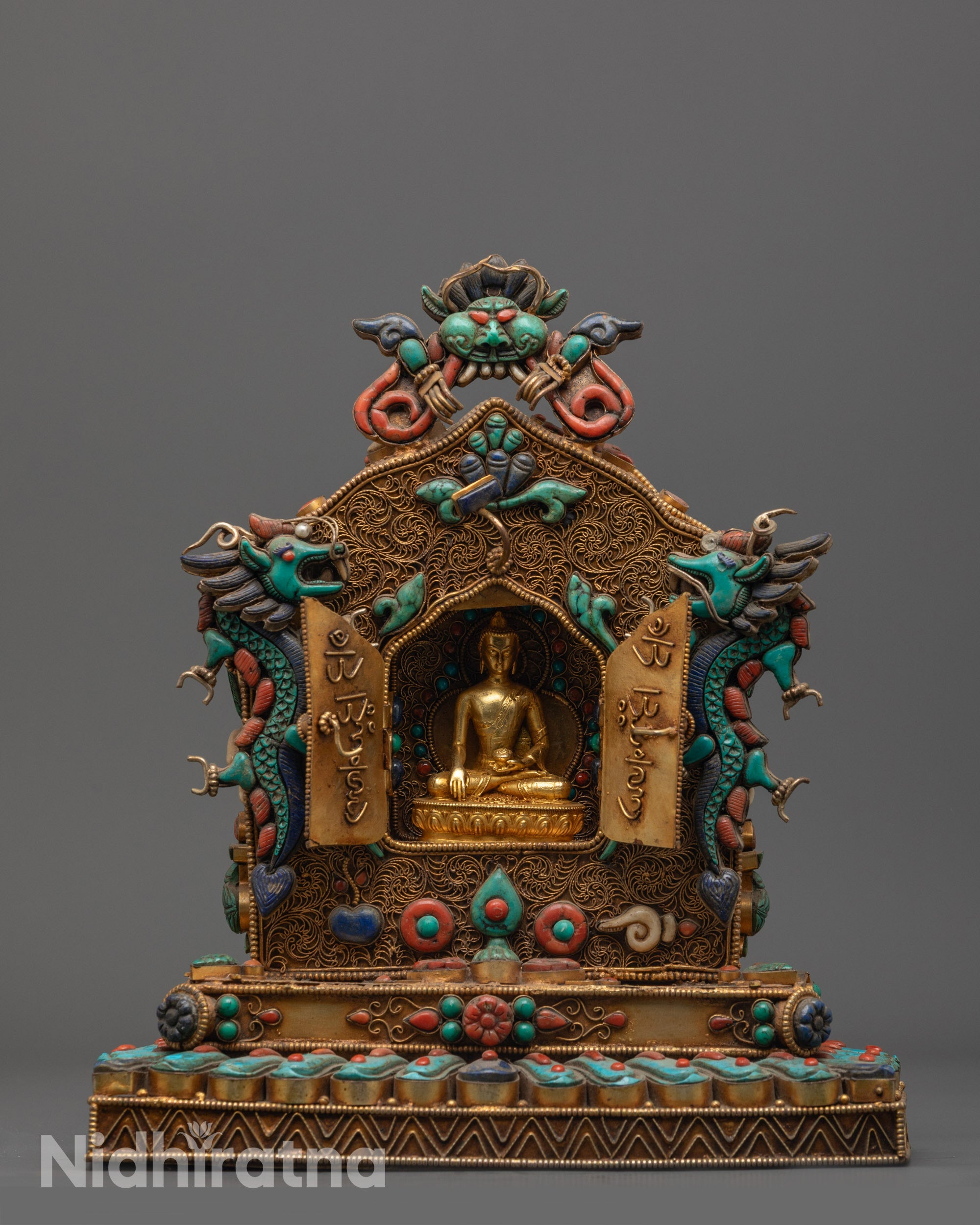 front view Buddha Shakyamuni Ghau Box with gold filigree and semi-precious stone details