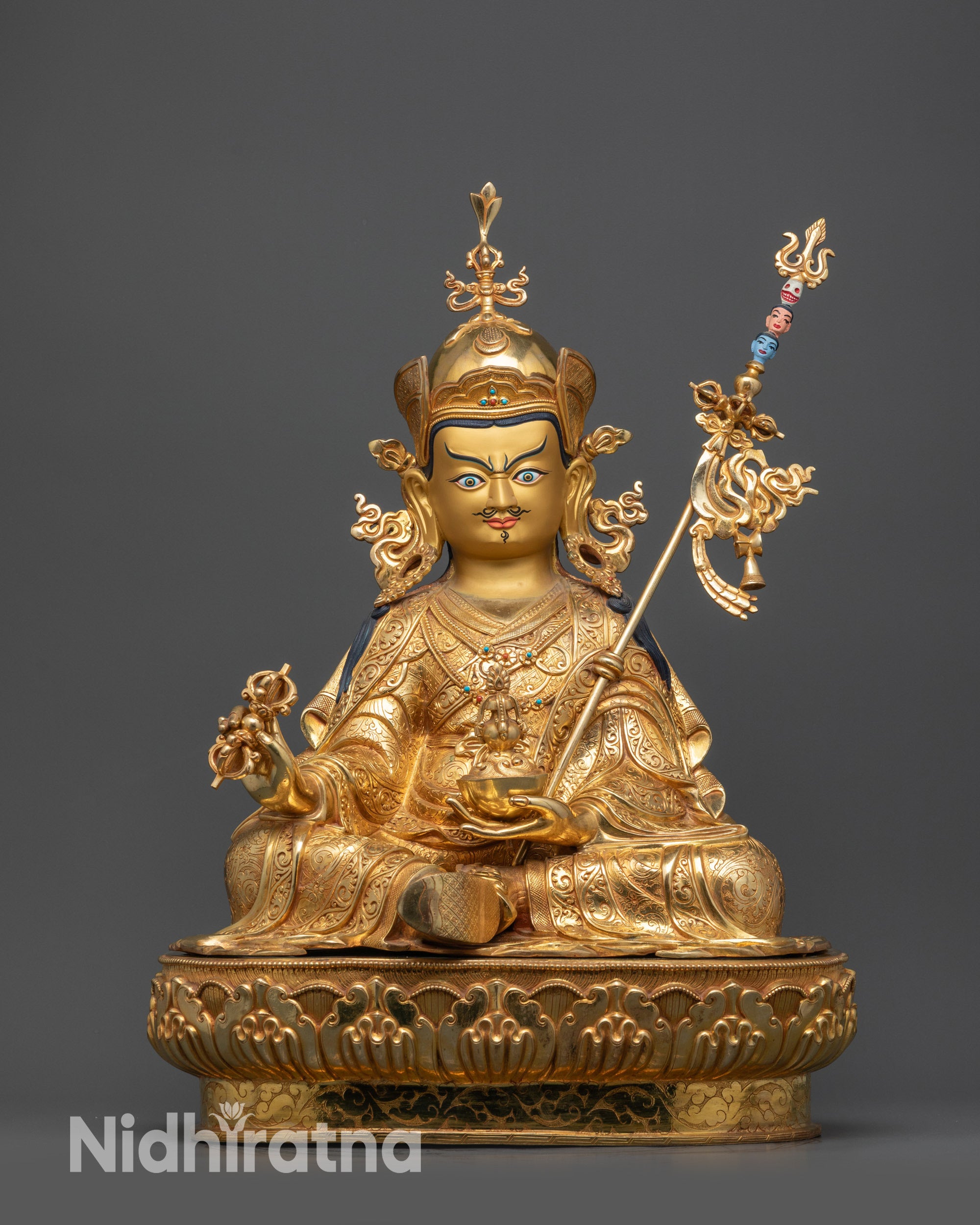 front view Guru Rinpoche Padmasambhava statue on lotus seat with gold-gilded face