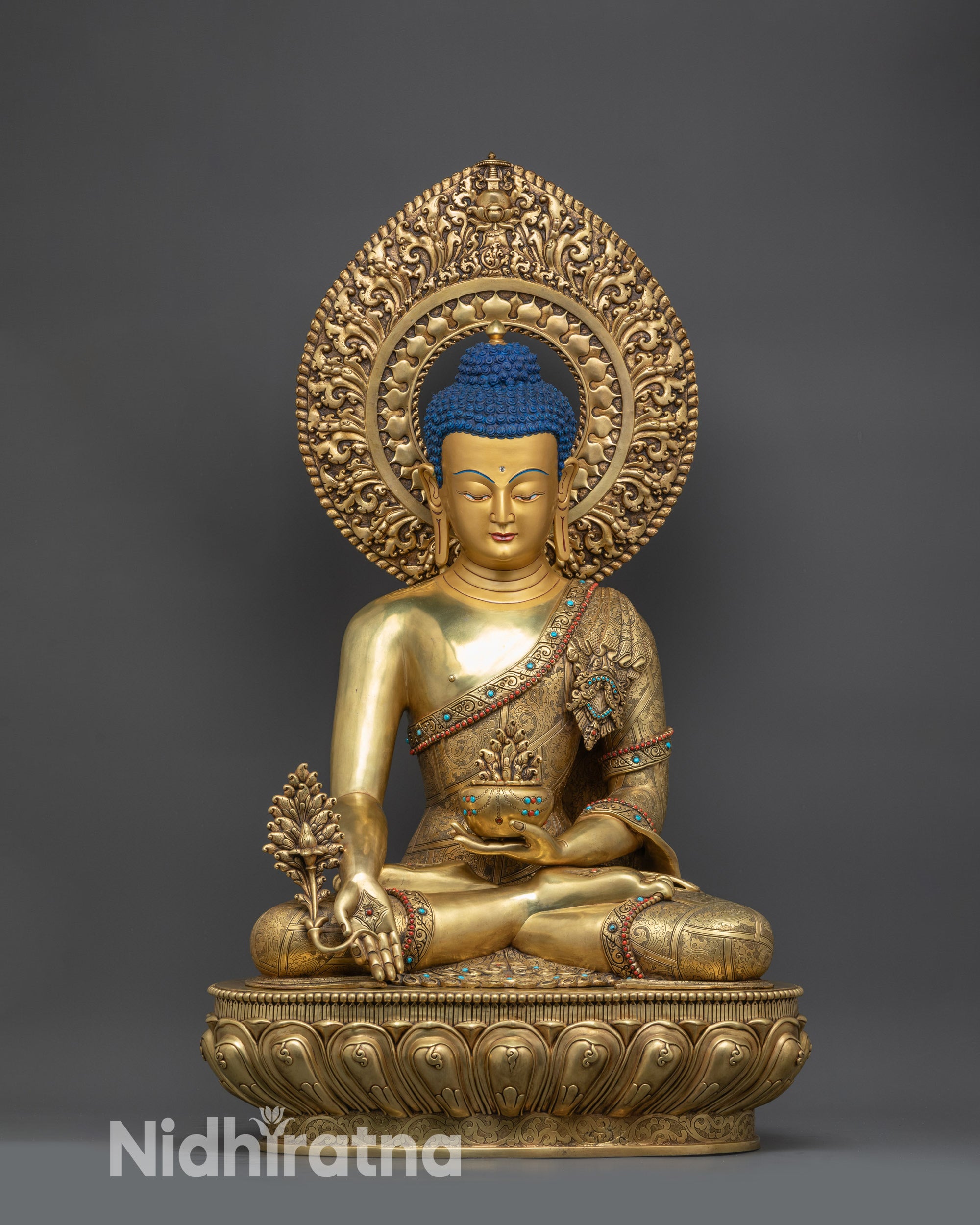 front view Premium Medicine Buddha Healing Sculpture with gold-gilded face and halo