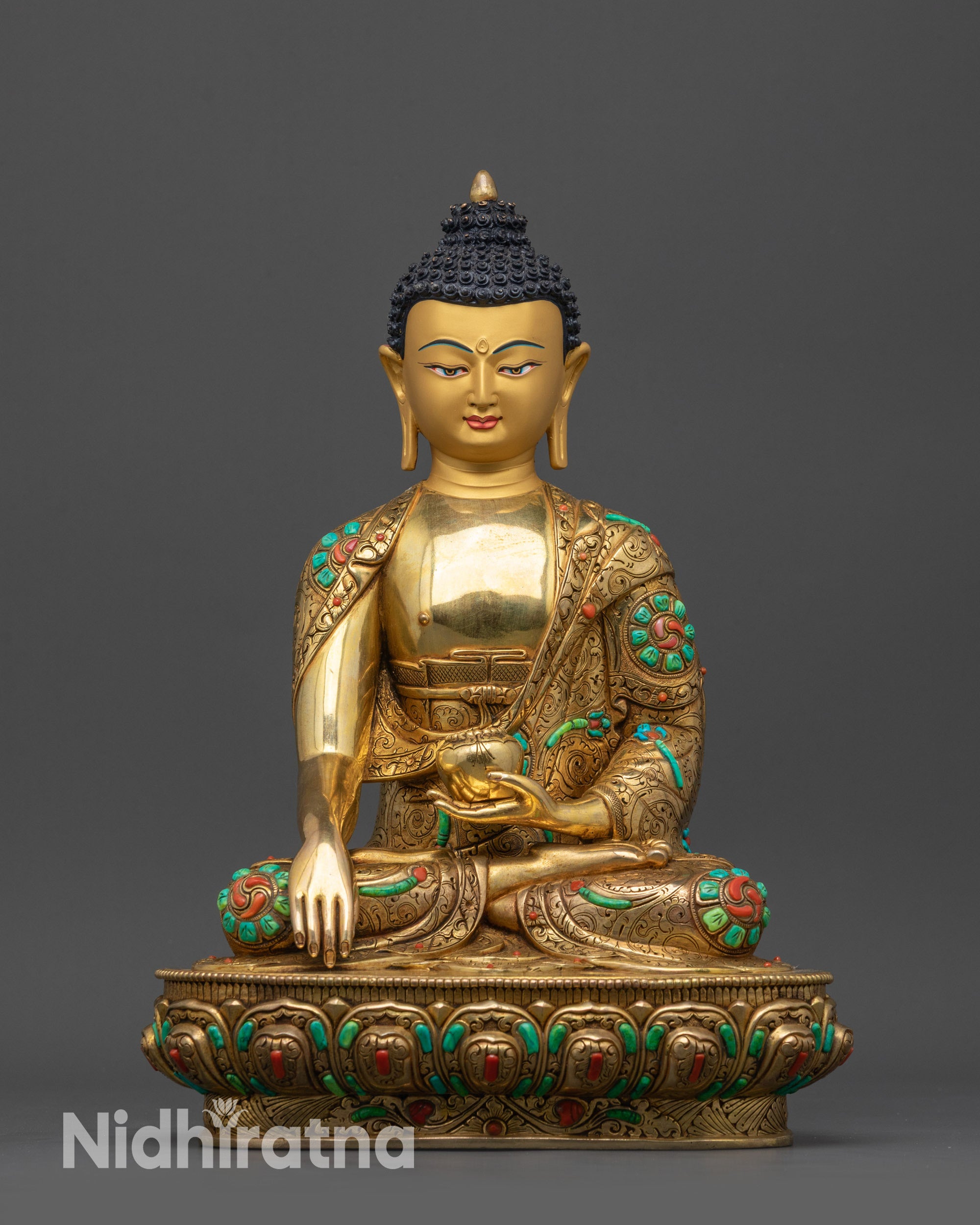 front view Tibetan Shakyamuni Buddha Statue with serene expression and carved robe