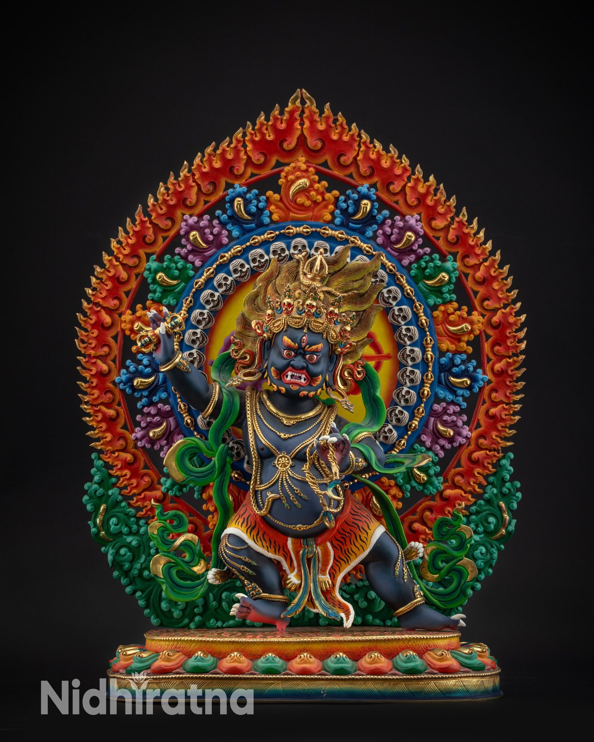 front view Vajrapani statue with raised vajra and lasso in commanding stance