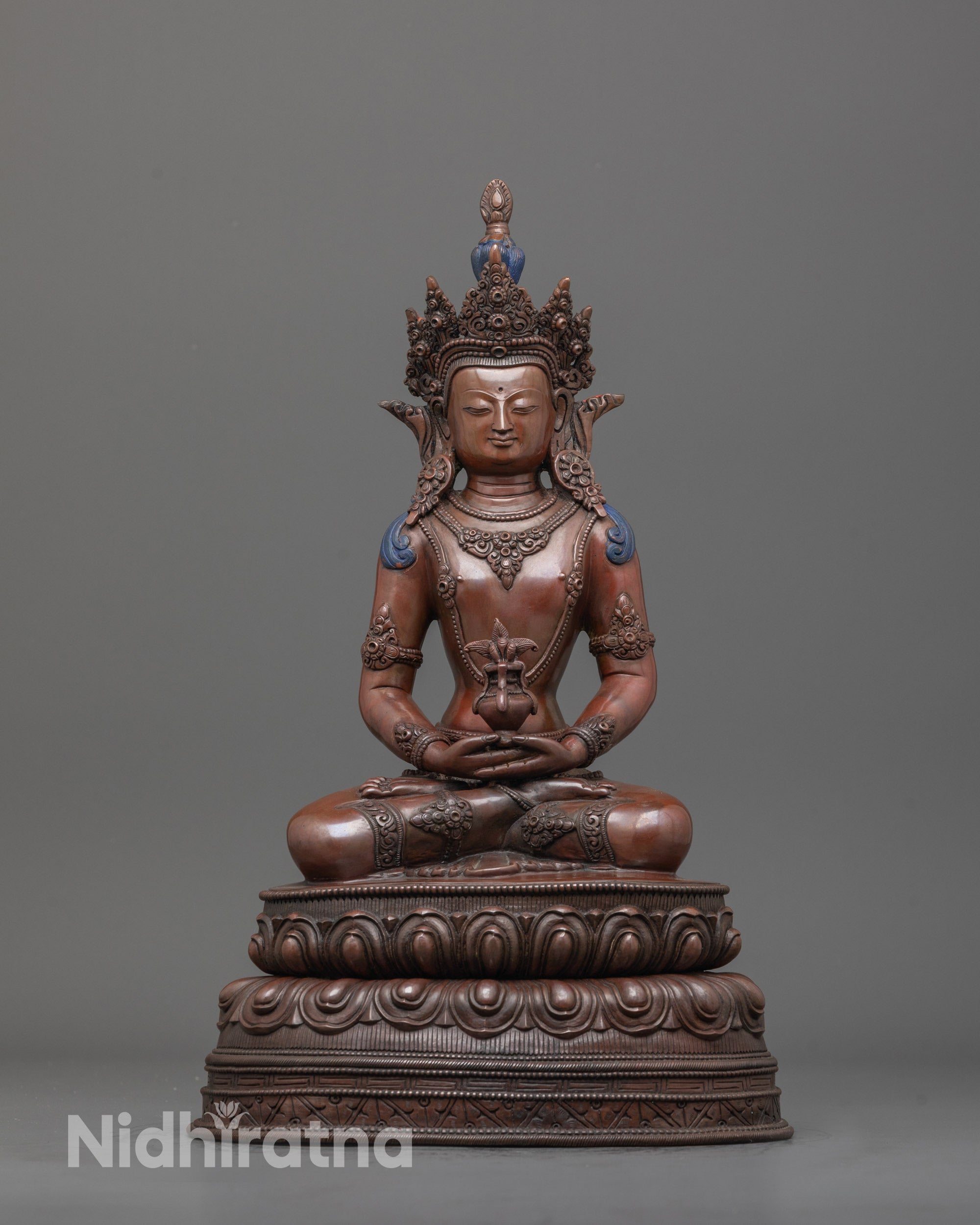 front view of Amitayus statue in dhyan mudra on double lotus base, oxidized copper