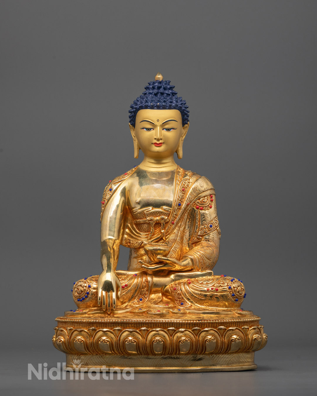 front view of Shakyamuni Tathagata Buddha Statue with gold-gilded face and copper base