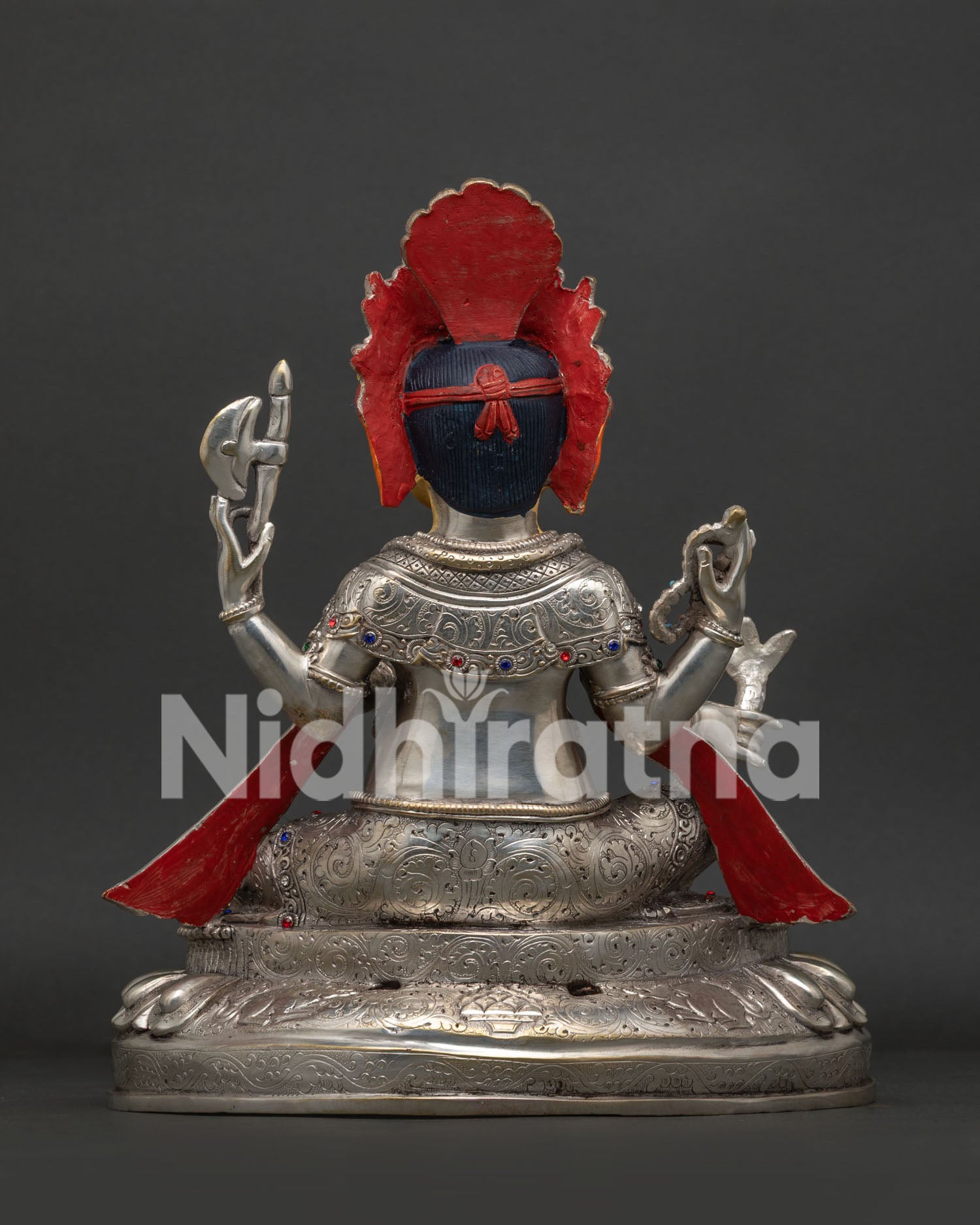 Ganesh statue back view displaying silver-plated handcrafted deity with detailed lotus throne base