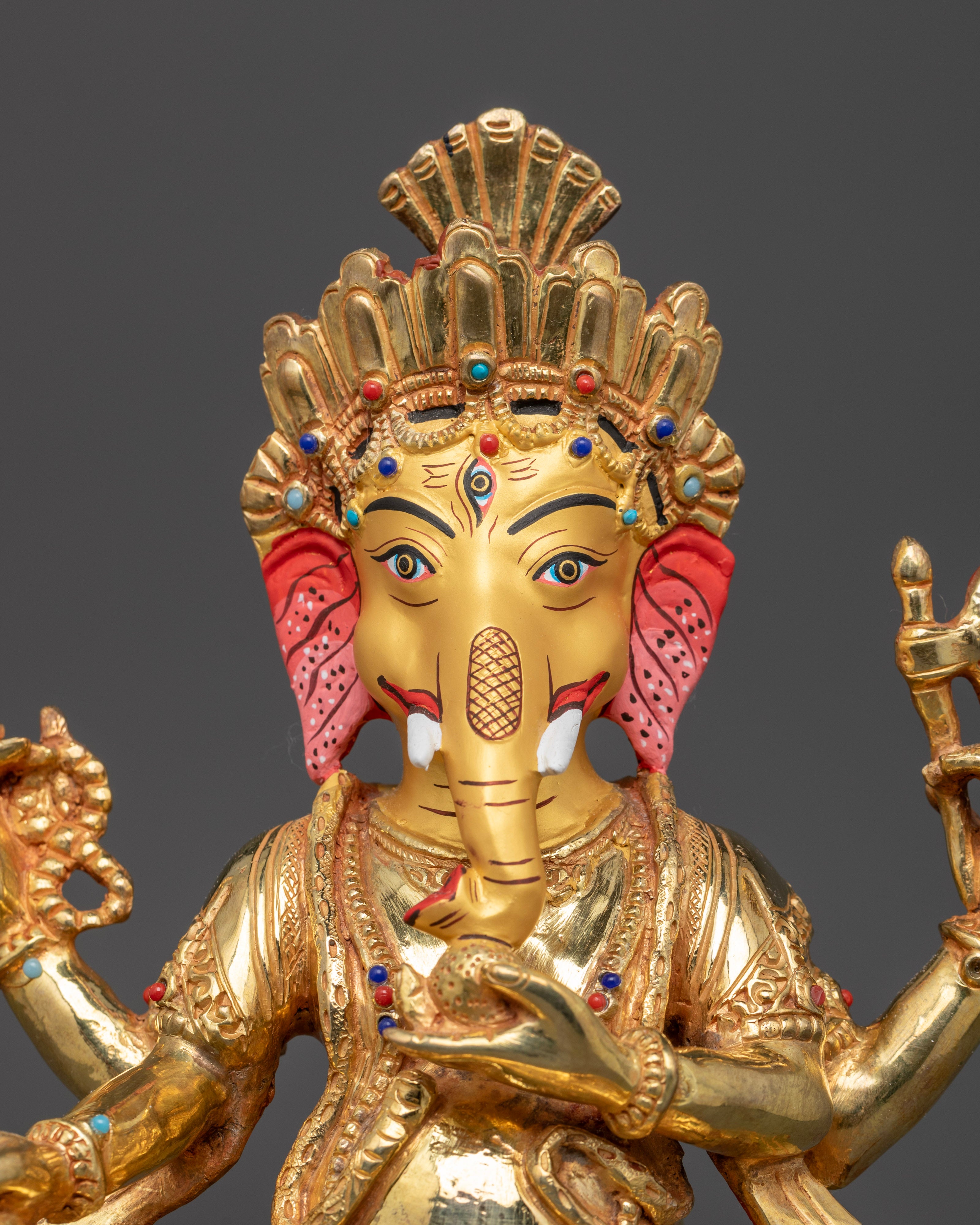 twenty four karat pure gold plated face of ganesh statue