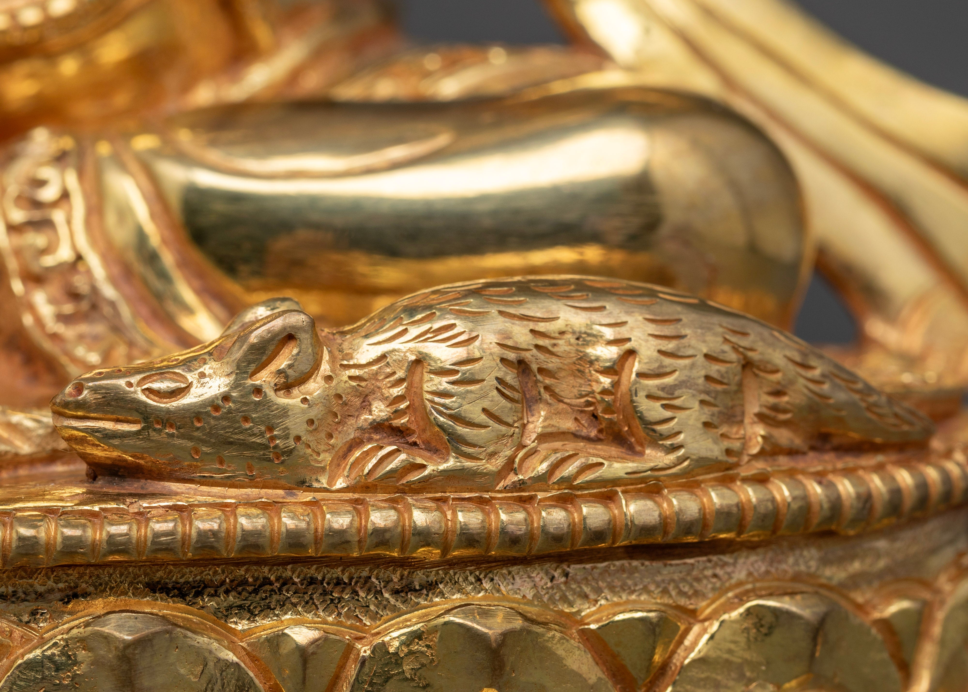 ganesh statue mouse golden